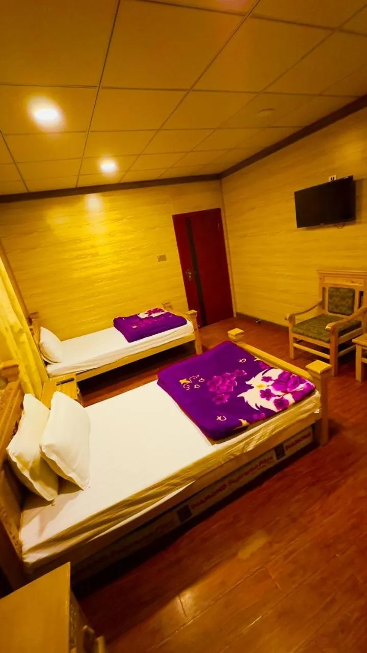 Bed in Gems Palace Hotel Sost