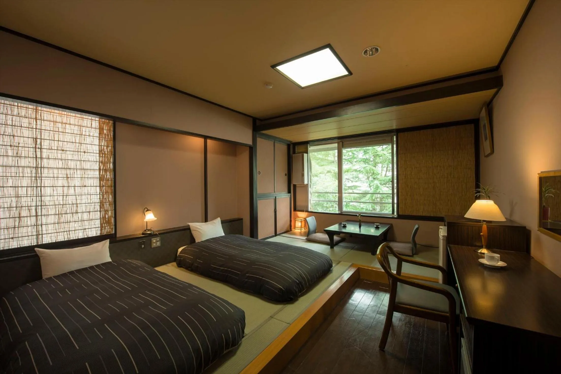 Bed in Takamiya Hotel Lucent