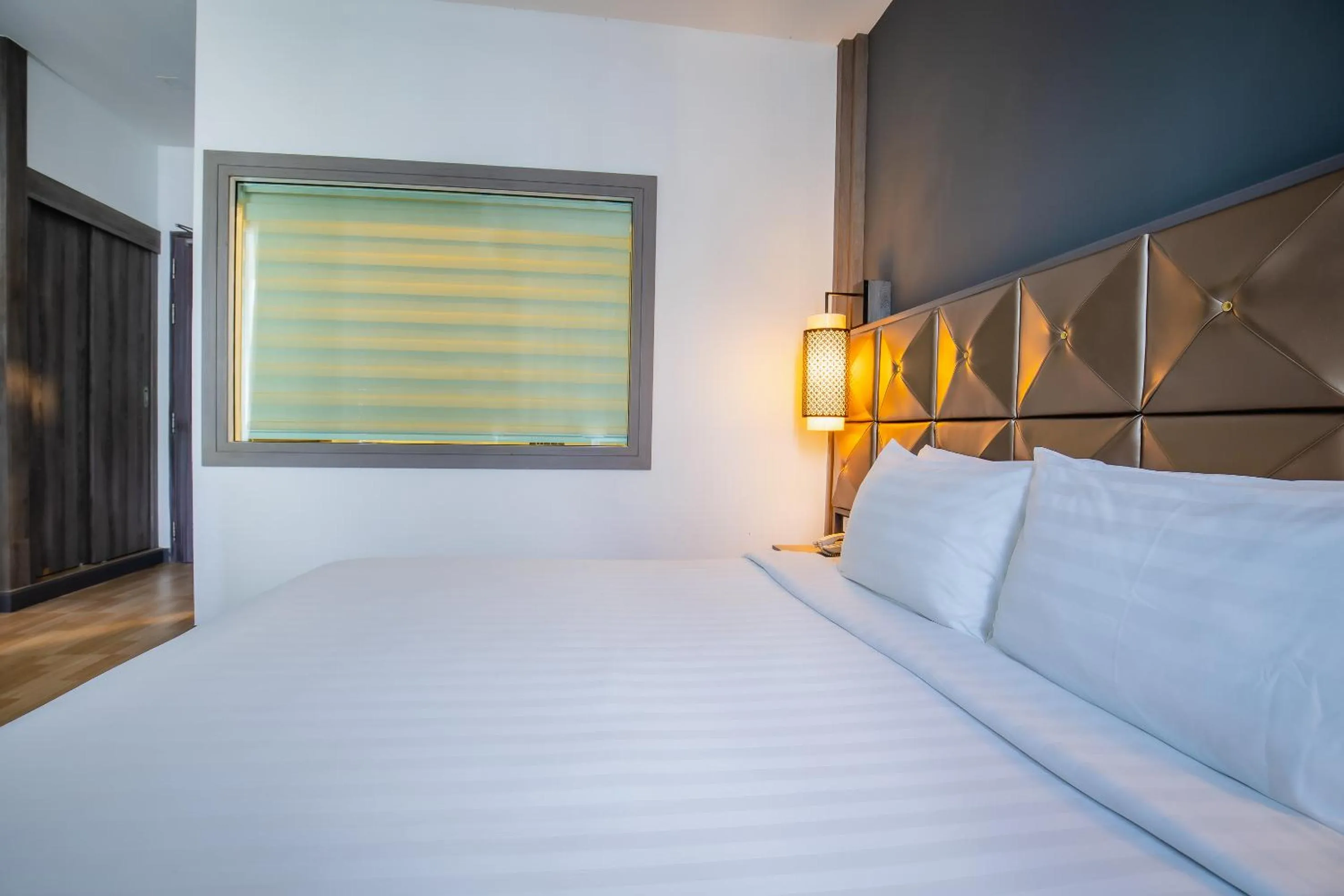 Bed in Add Plus Hotel & SPA