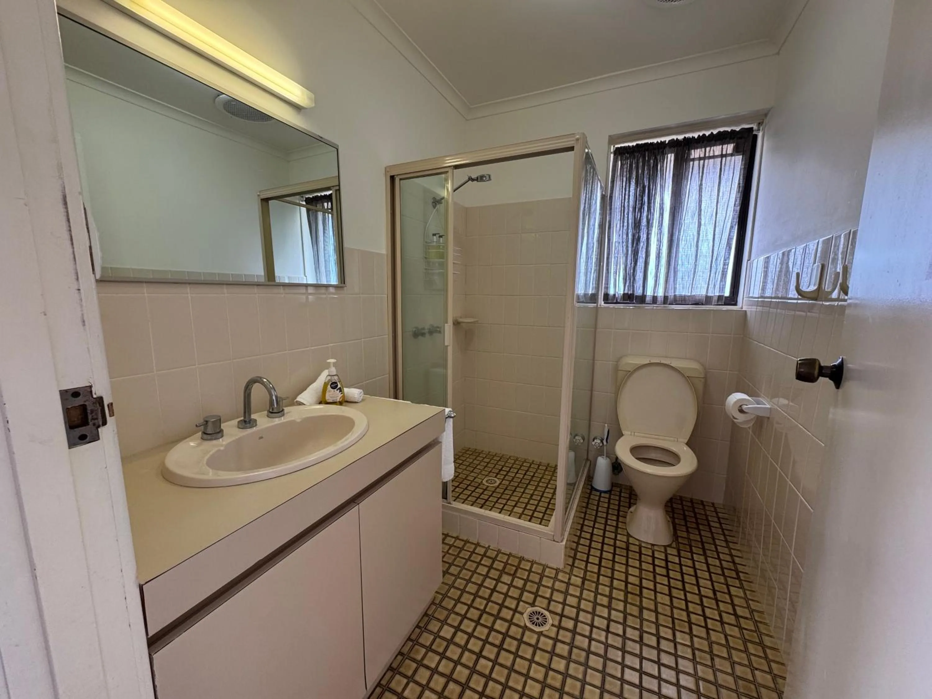 Bathroom in Narooma Palms Holiday Apartments