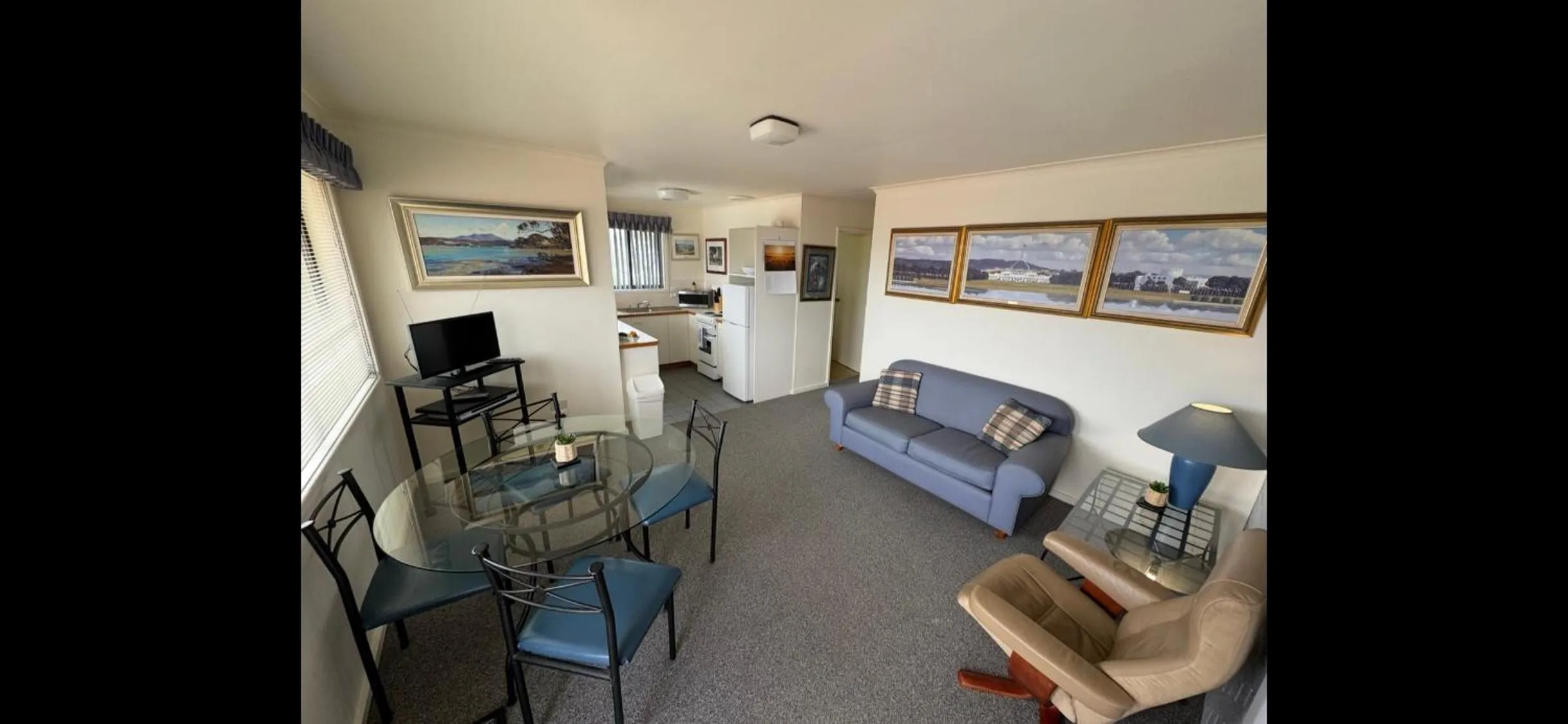 Living room in Narooma Palms Holiday Apartments