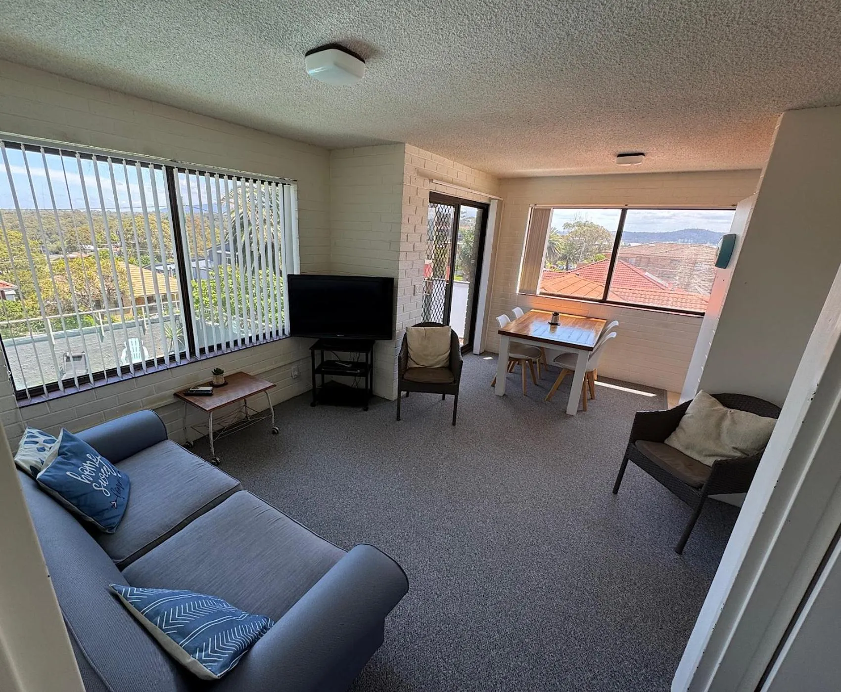 Living room in Narooma Palms Holiday Apartments
