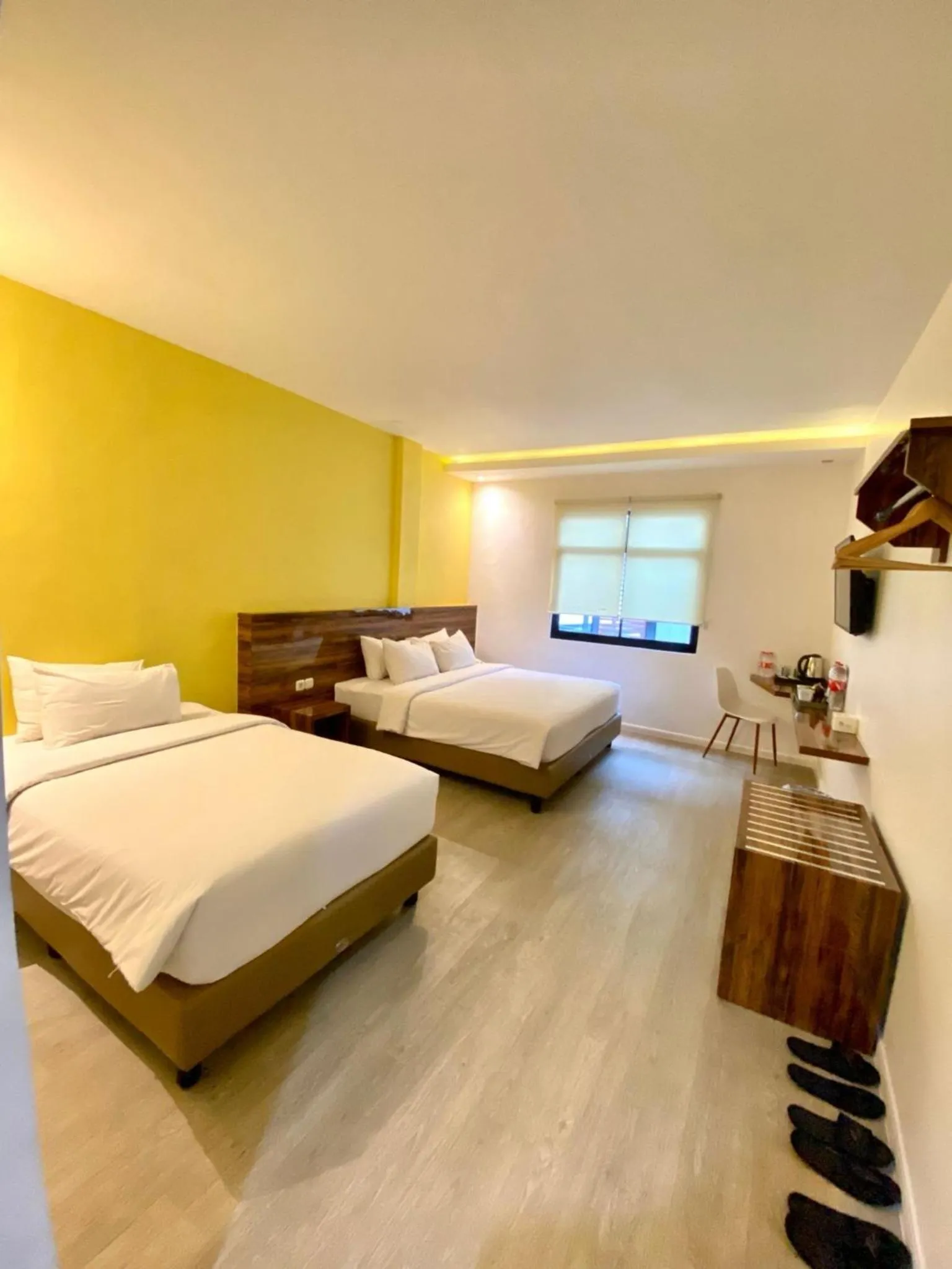 Bed in Rid's Hotel Palembang