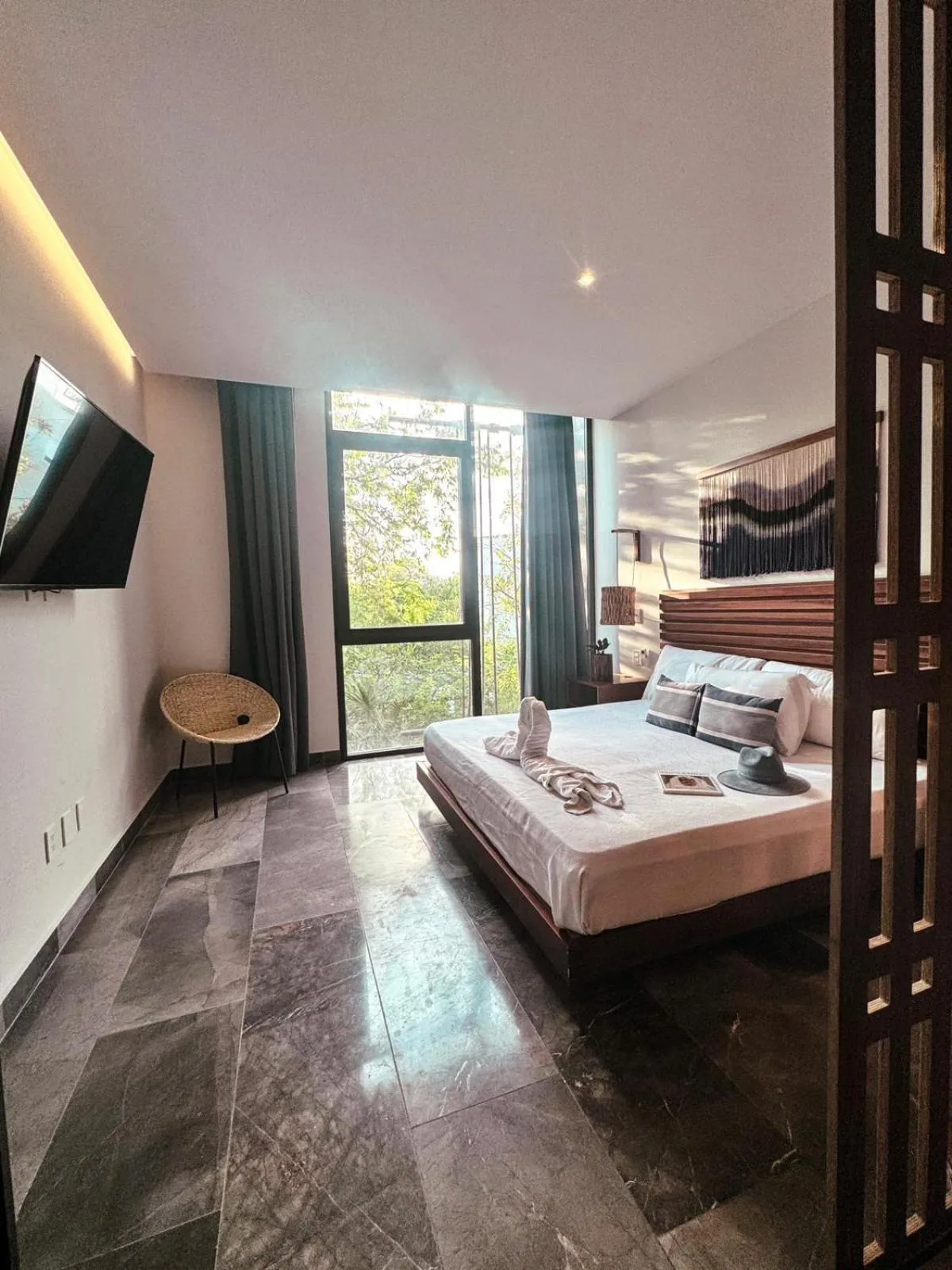 Bed in IIK Tulum by Groovy Stays- A Hip Condo-Hotel with WIFI, Rooftop, Pool, Sleeps 6