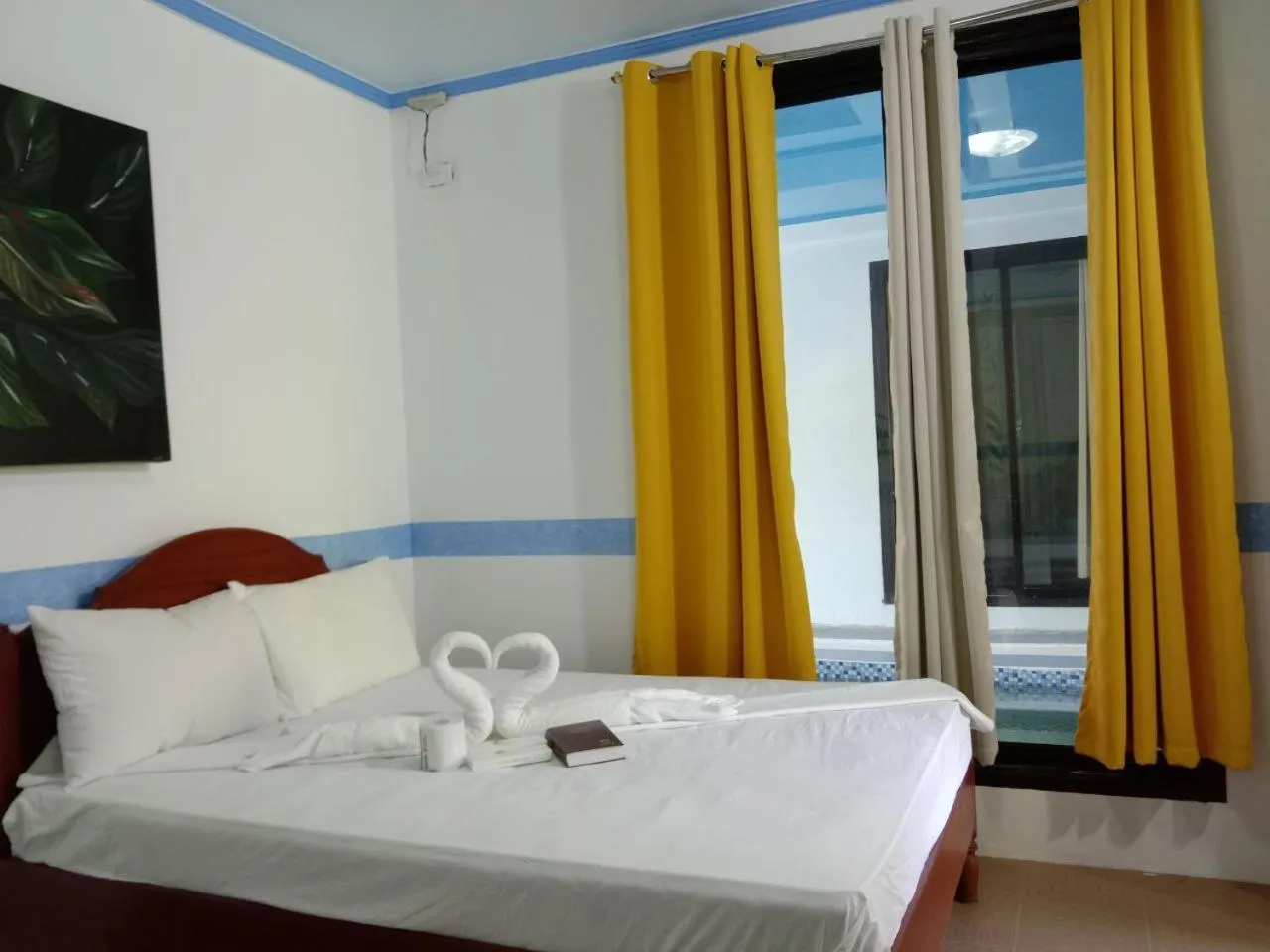 Bed in RedDoorz @ Isla Virginia Beach Resort Aurora Baler