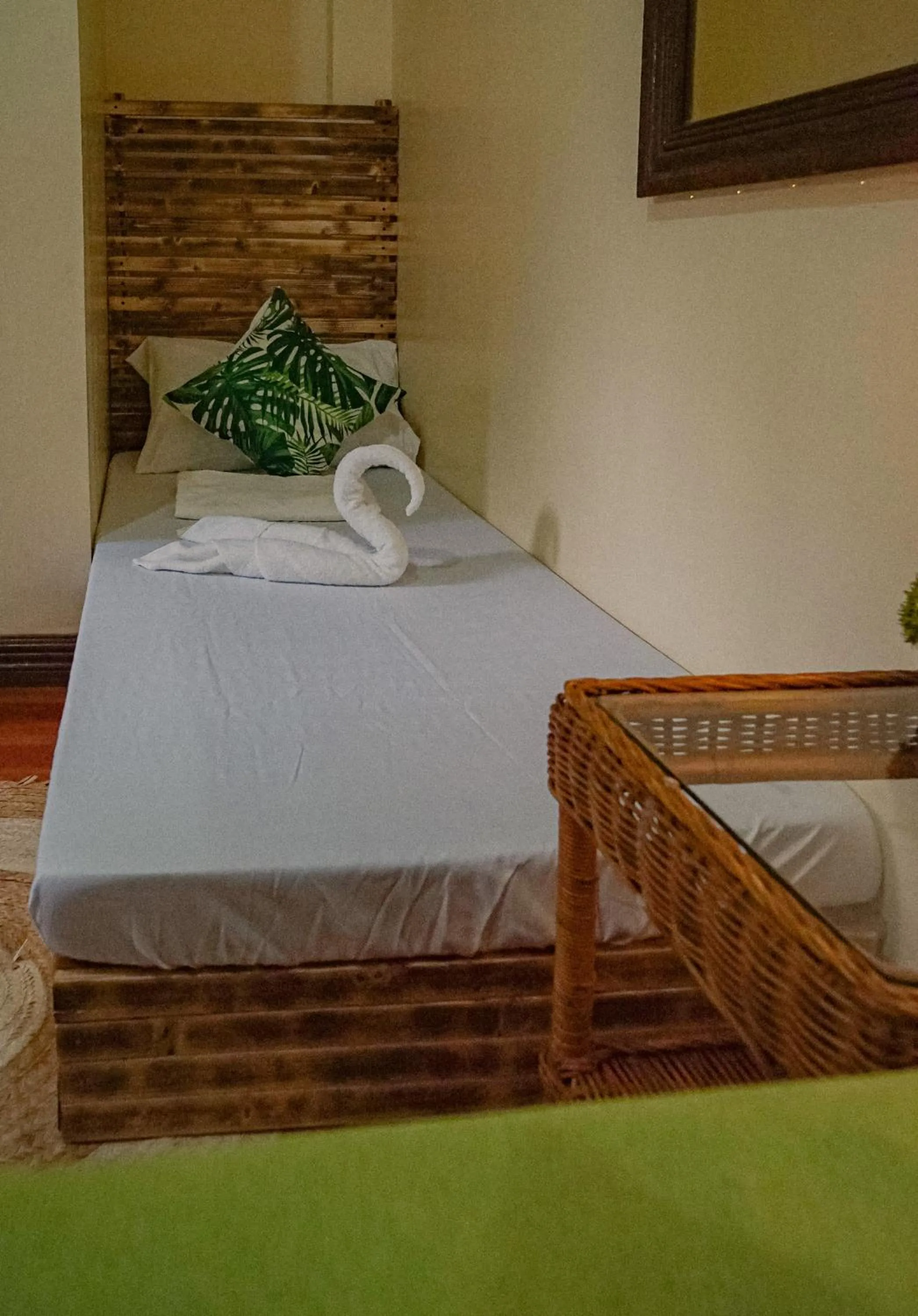 Bed in The Palms Resort & Bar