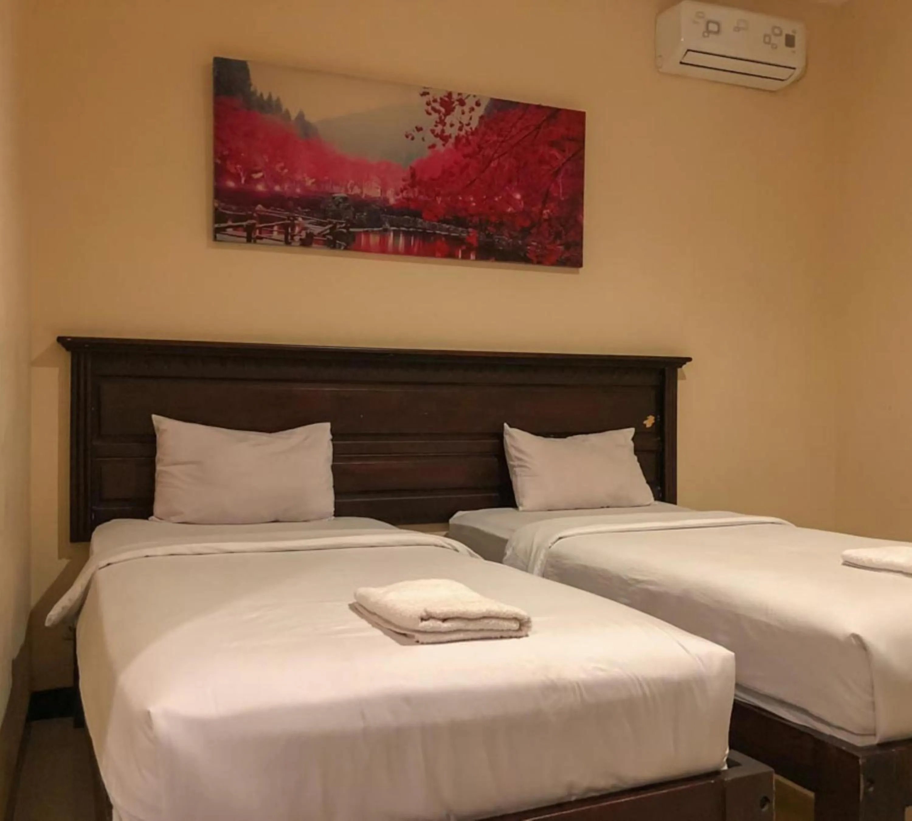 Bed in Hotel D'Mario Palopo