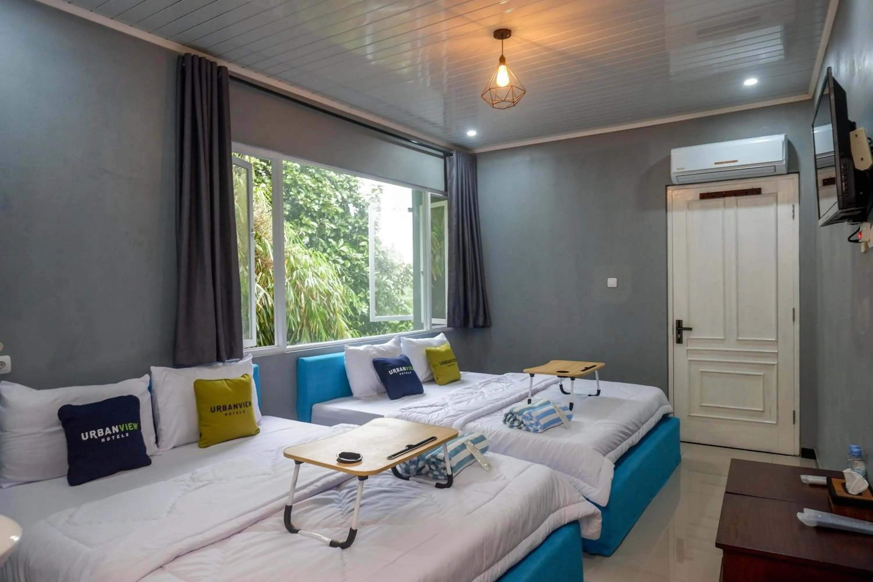 Bedroom, Bed in Urbanview Hotel Umbrella Dieng by RedDoorz