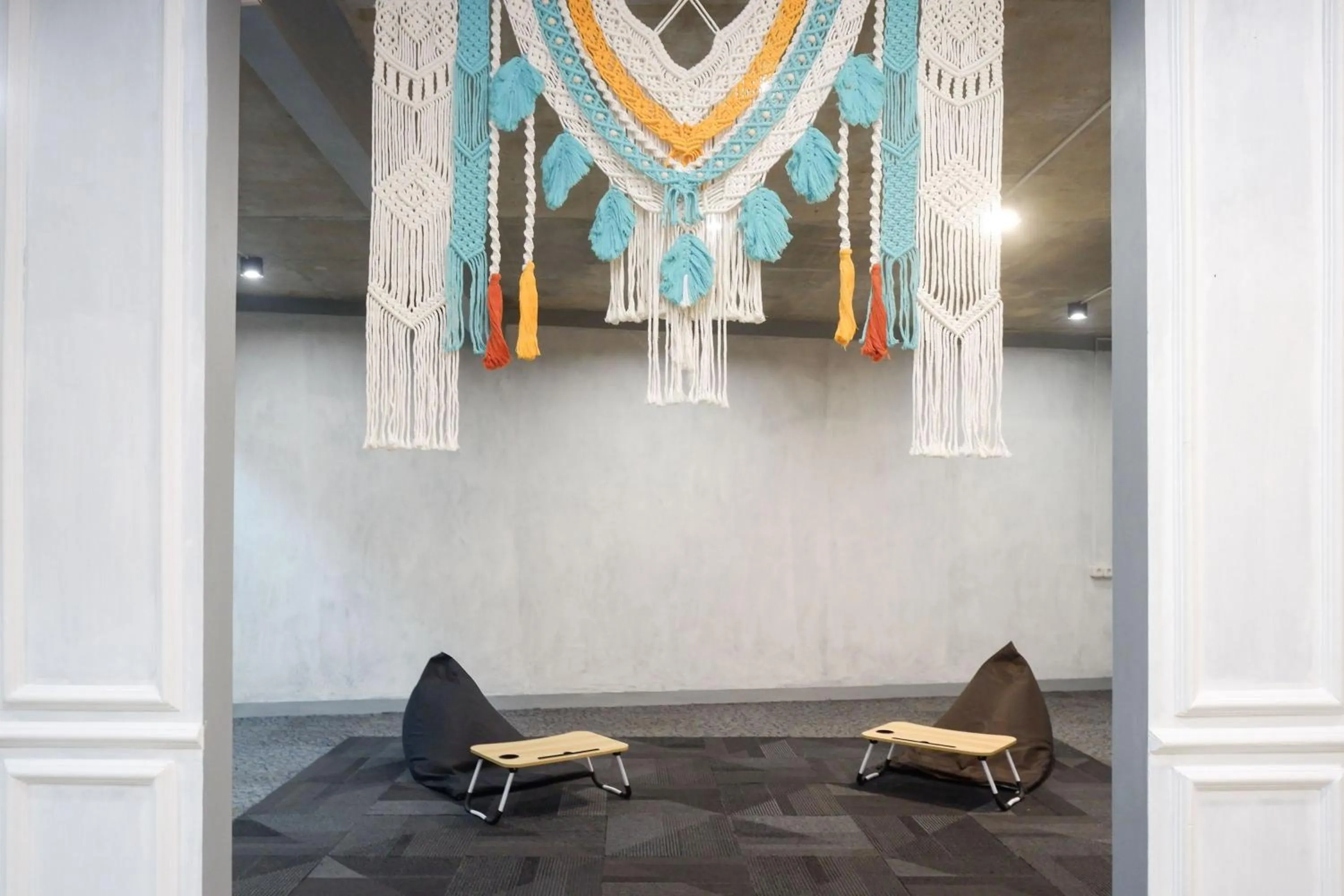 Seating area in Urbanview Hotel Umbrella Dieng by RedDoorz