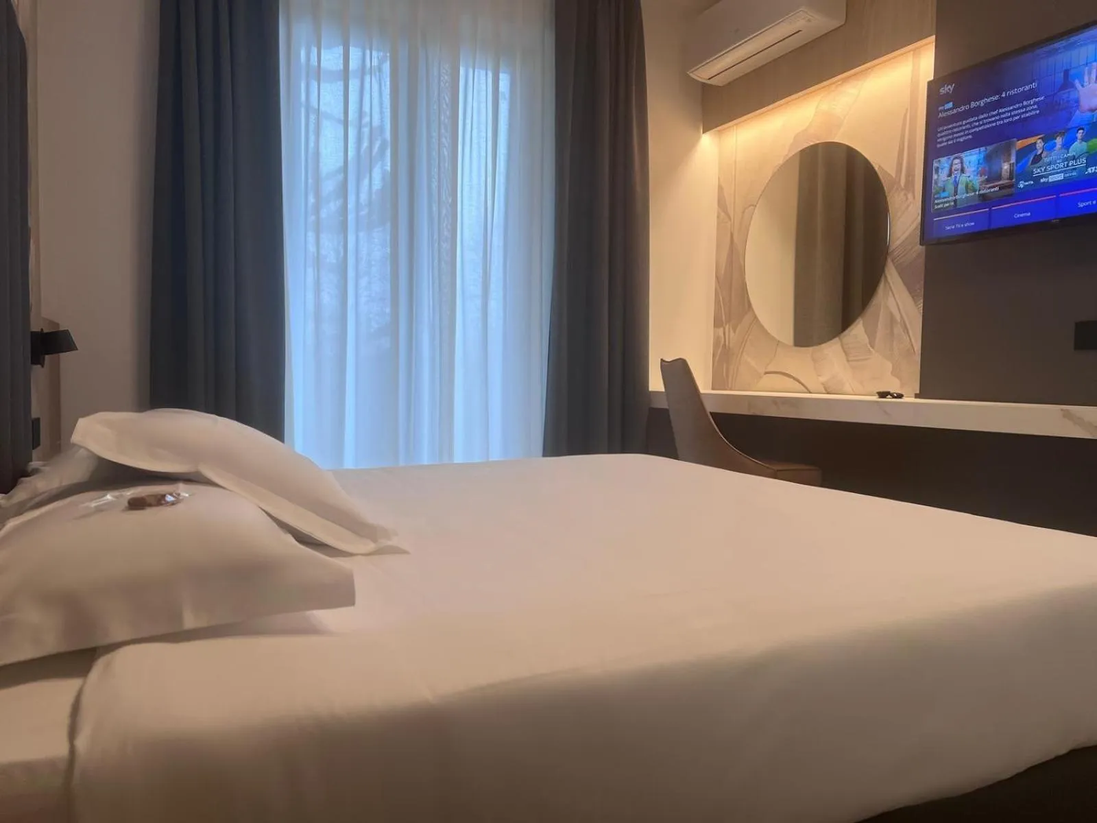 Bed in Hotel Gardenia