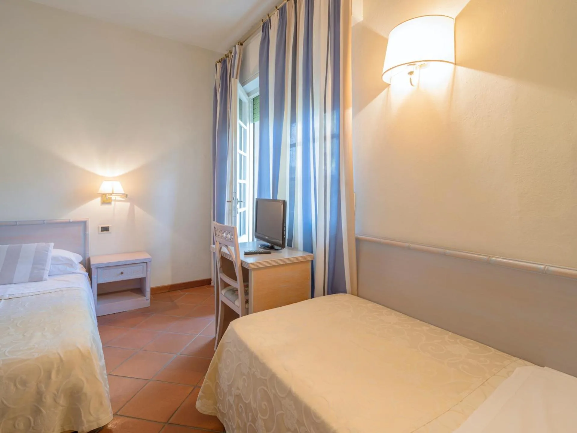 Bed in Hotel Mignon