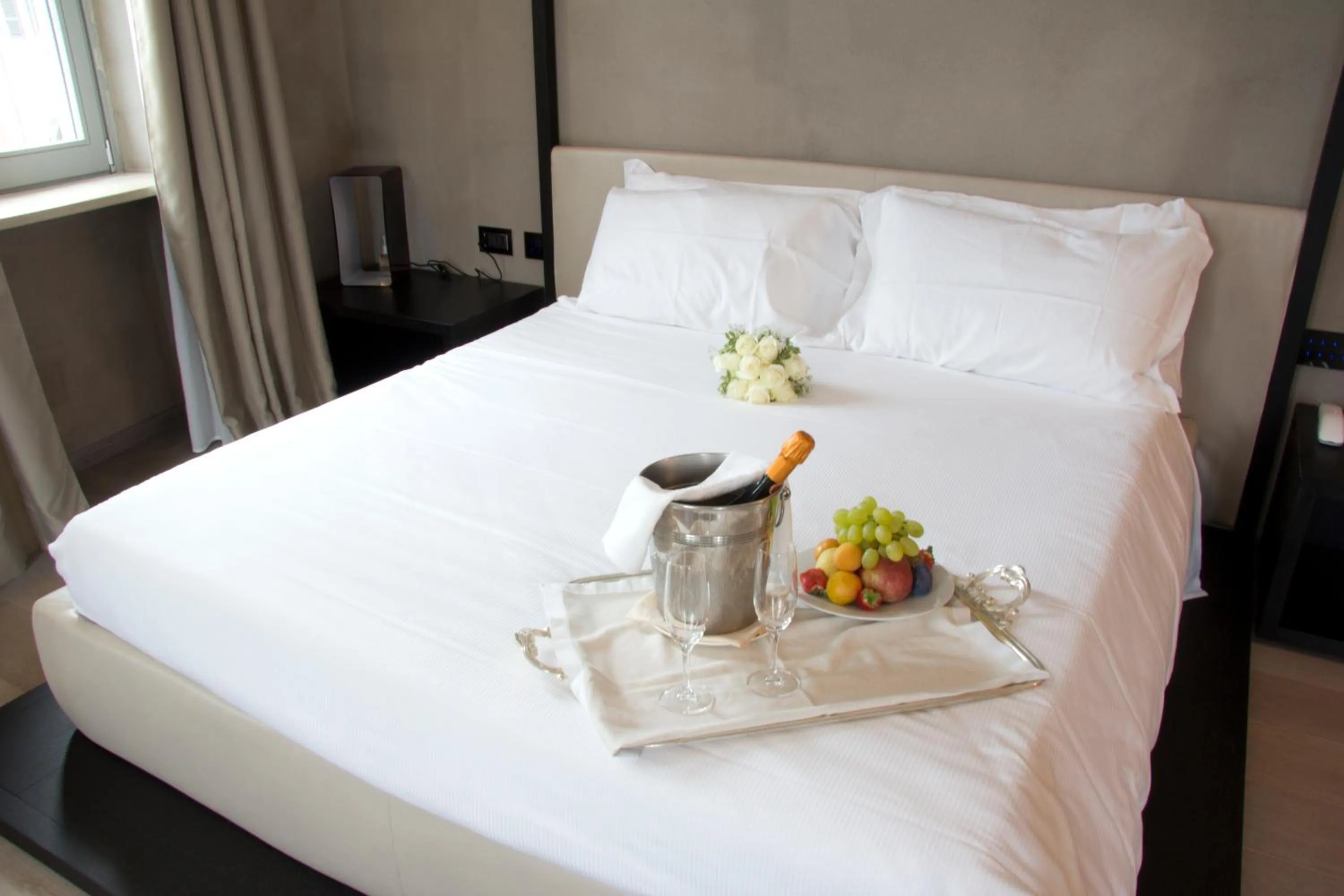 Bed in Hotel San Rocco