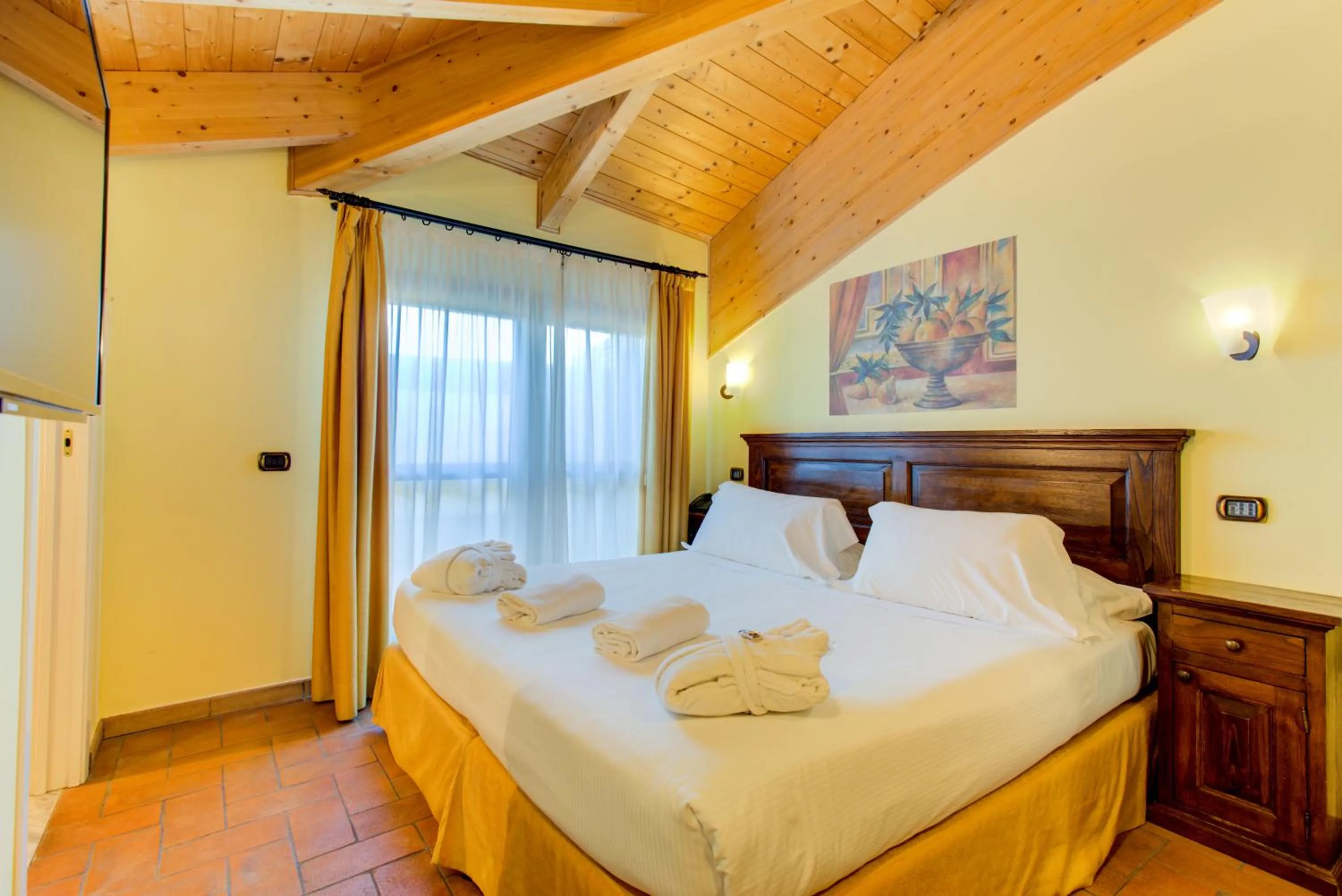 Bedroom, Bed in Oste del Castello Wellness & Bike Hotel