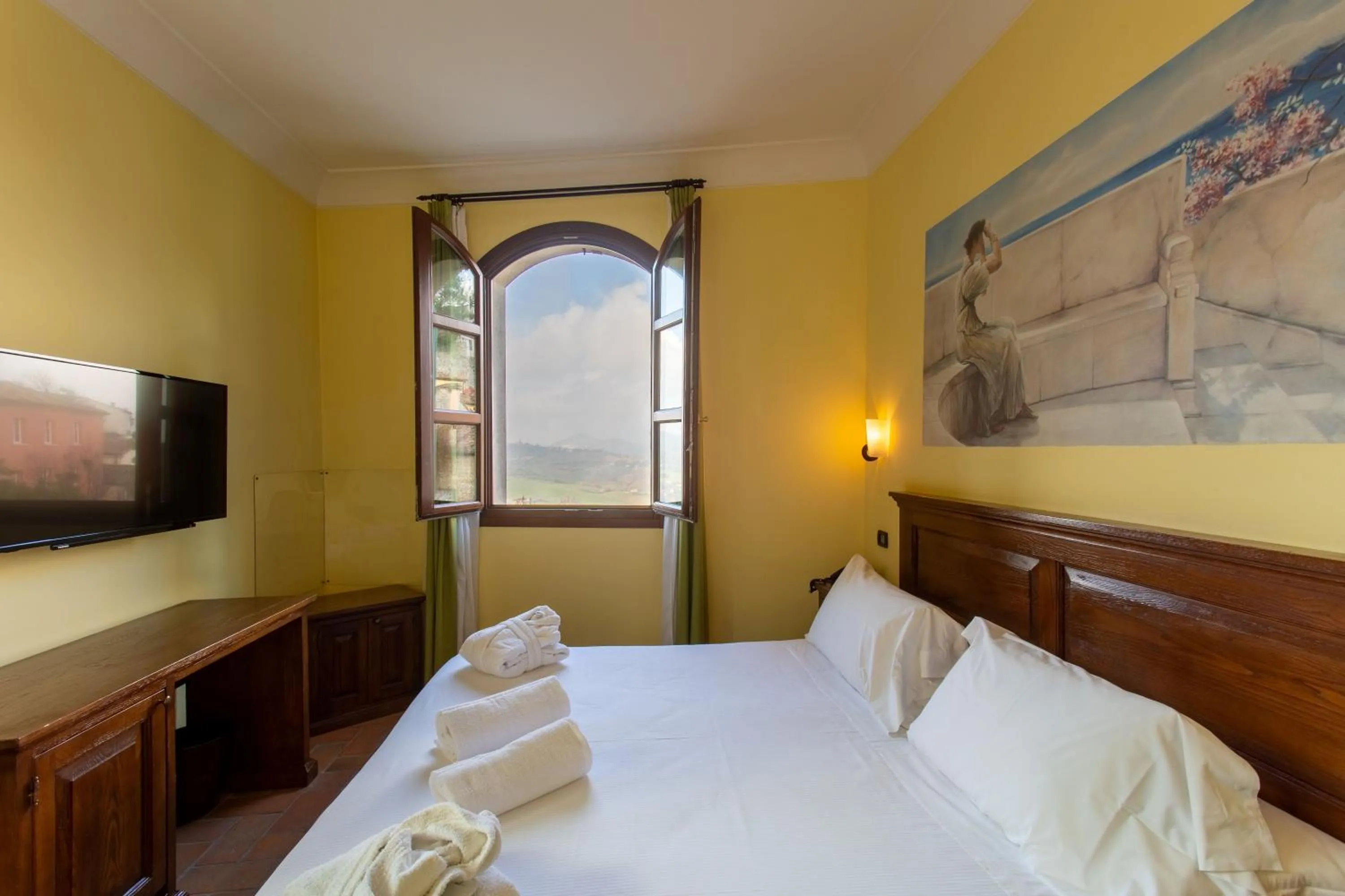Bedroom, Bed in Oste del Castello Wellness & Bike Hotel