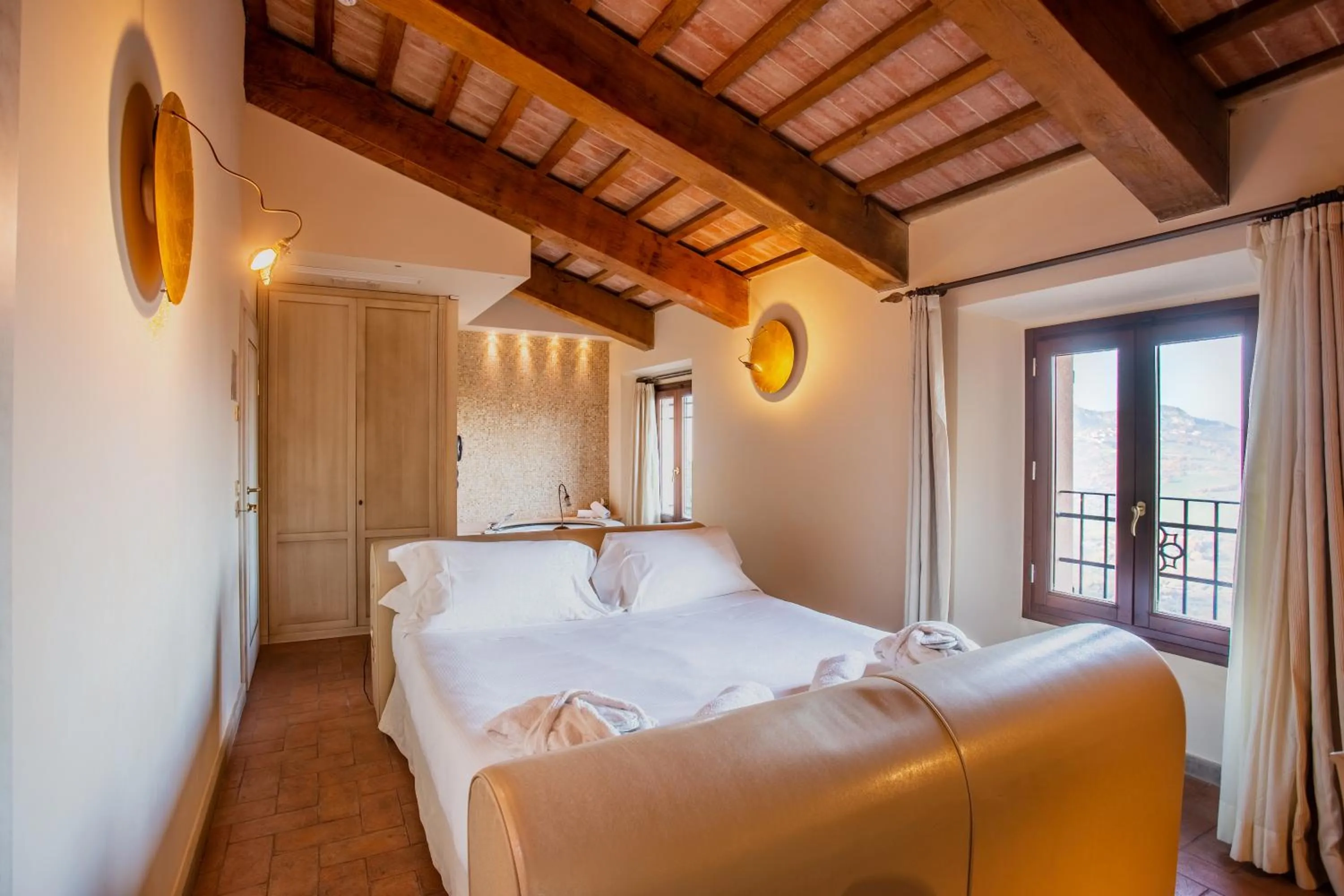 Bedroom, Bed in Oste del Castello Wellness & Bike Hotel