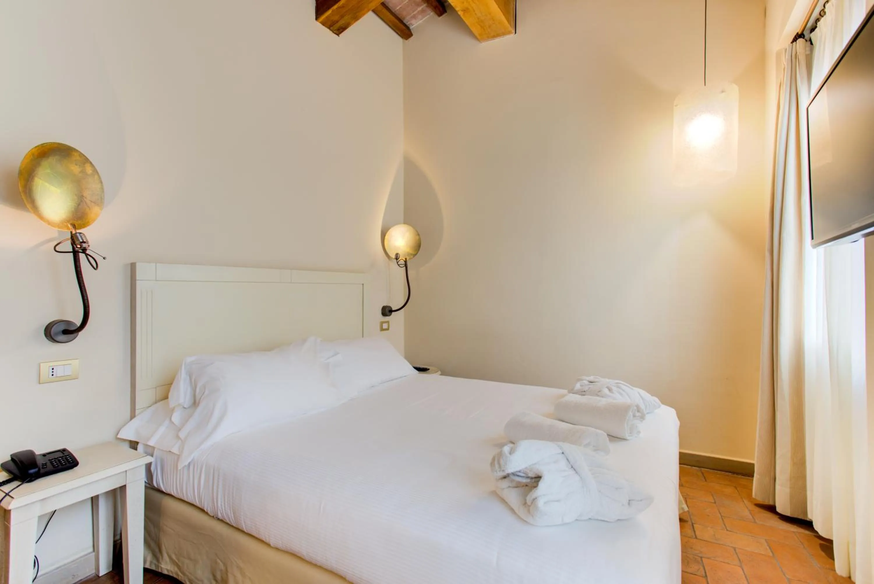 Bedroom, Bed in Oste del Castello Wellness & Bike Hotel