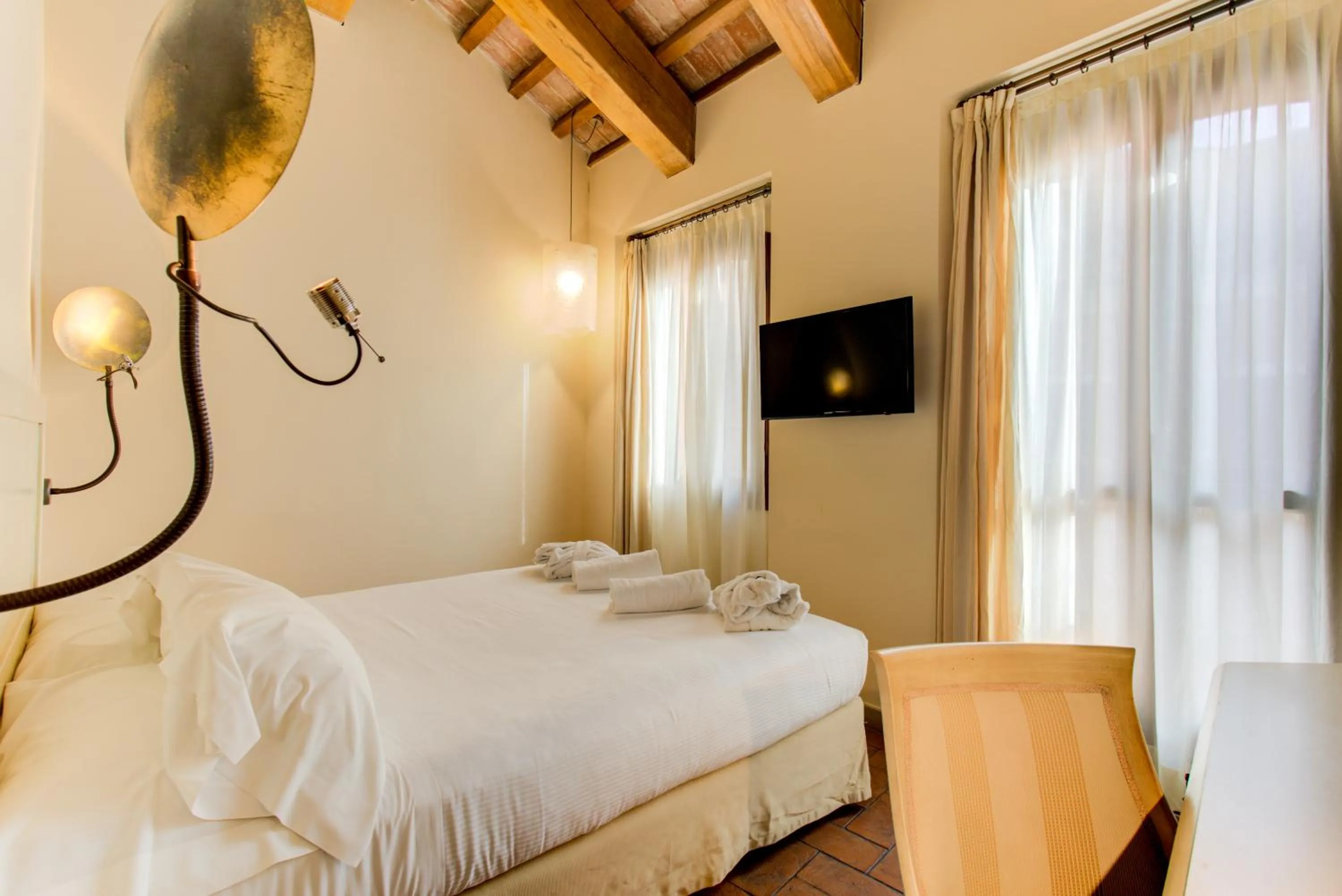 Bedroom, Bed in Oste del Castello Wellness & Bike Hotel
