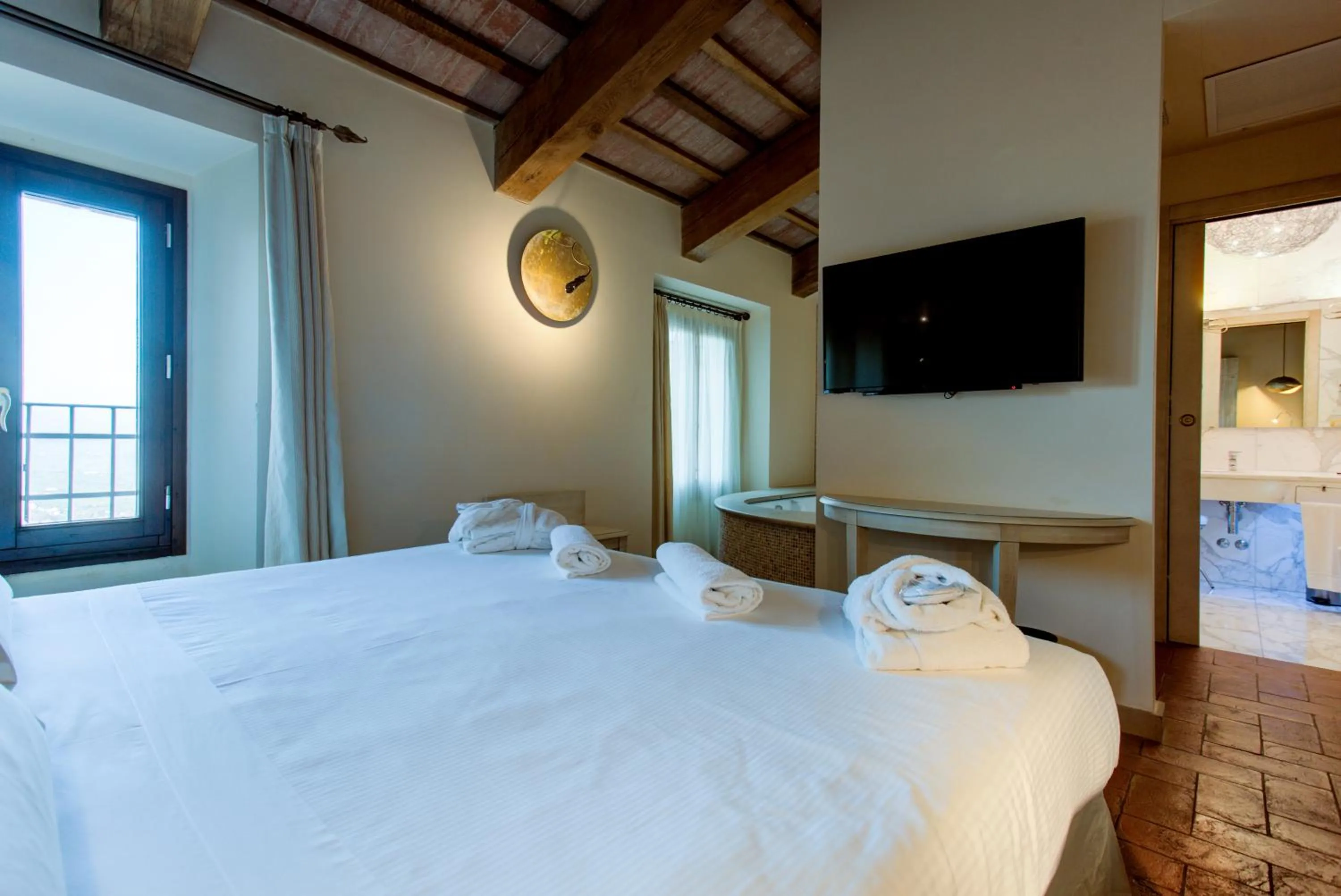 Bedroom, Bed in Oste del Castello Wellness & Bike Hotel