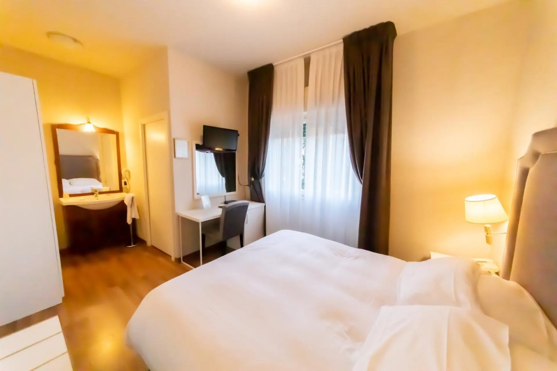 Bed in Hotel Viscardo