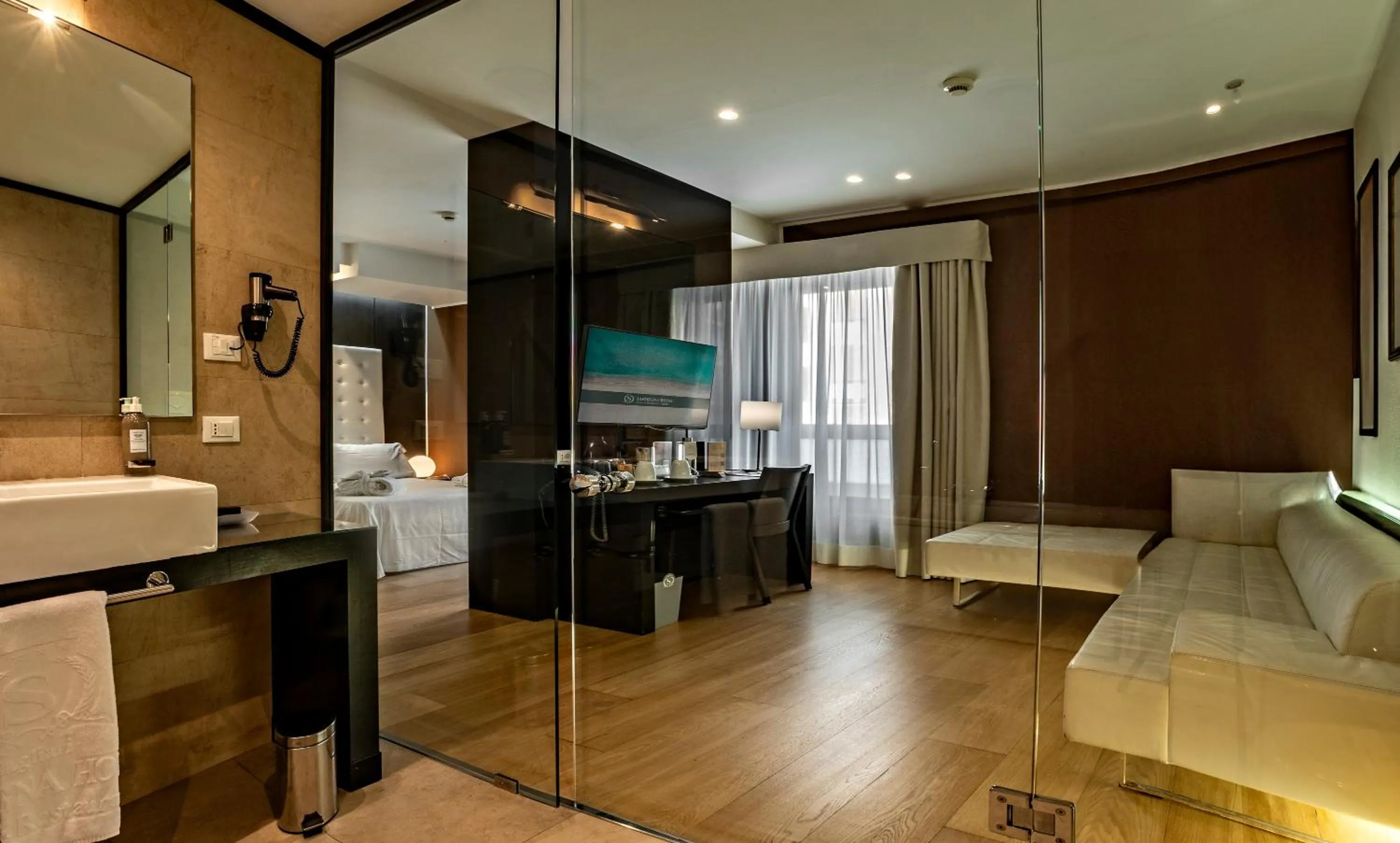 Bed in Sardegna Hotel - Suites & Restaurant