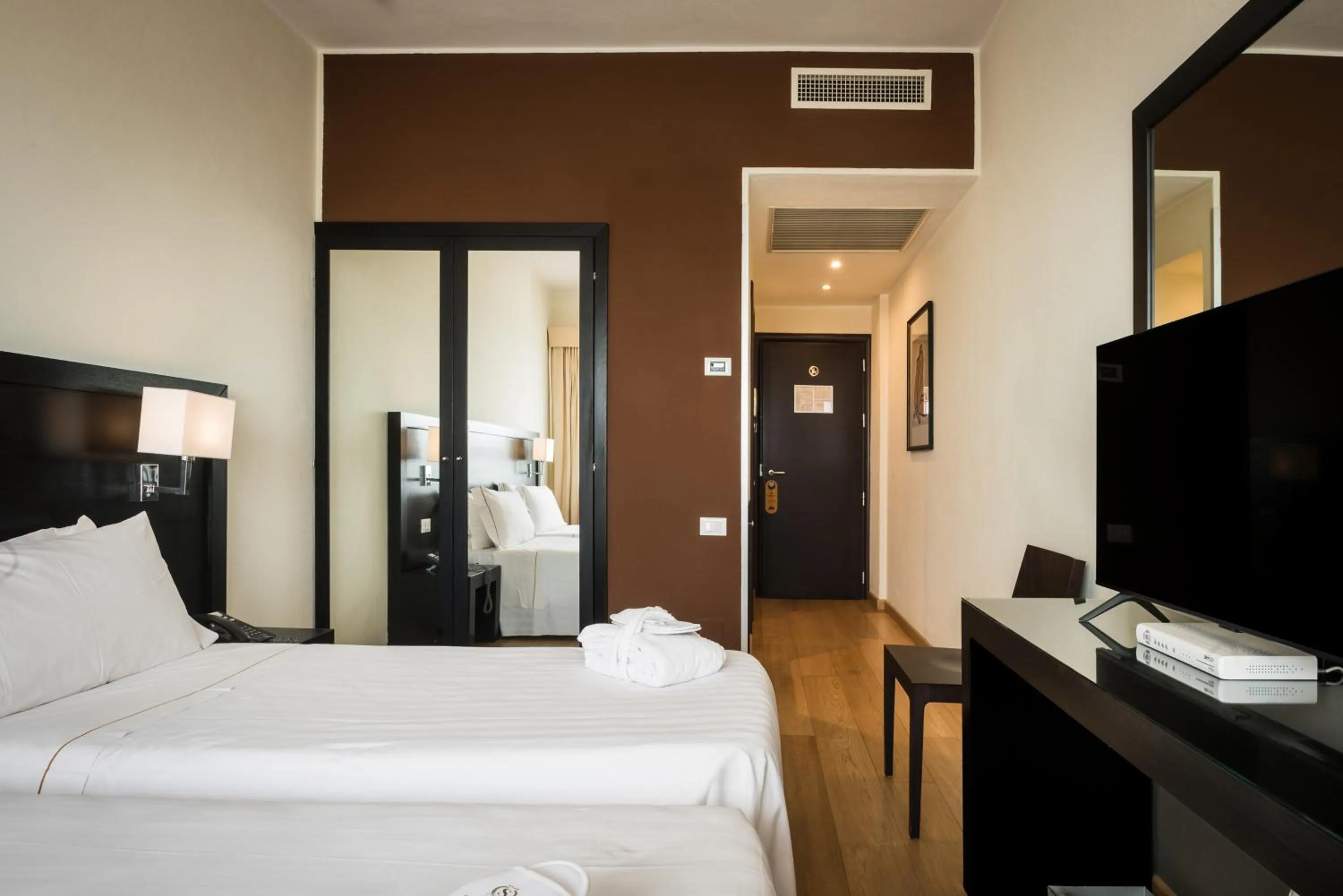 Bedroom, Bed in Sardegna Hotel - Suites & Restaurant