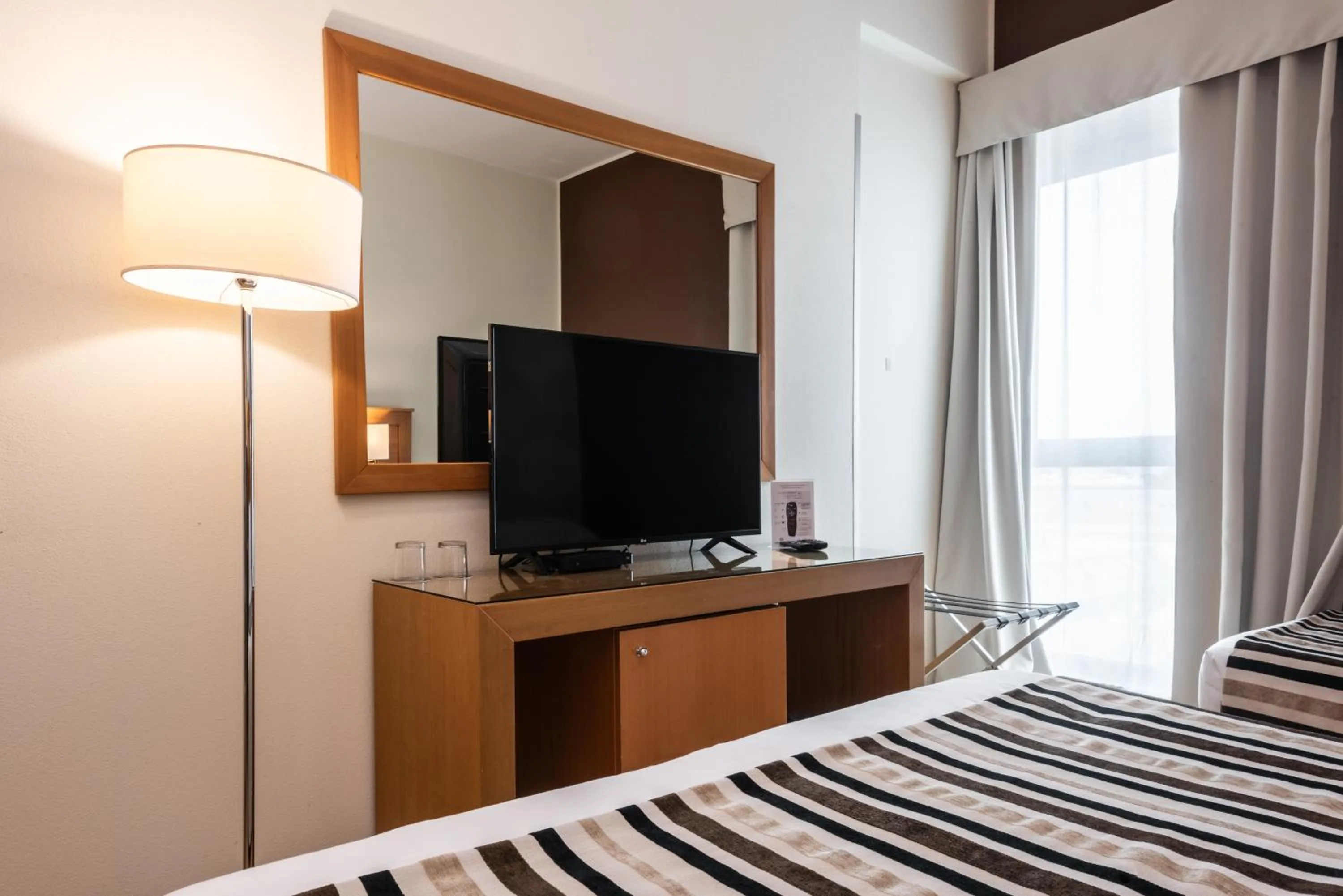 Bedroom, Bed in Sardegna Hotel - Suites & Restaurant