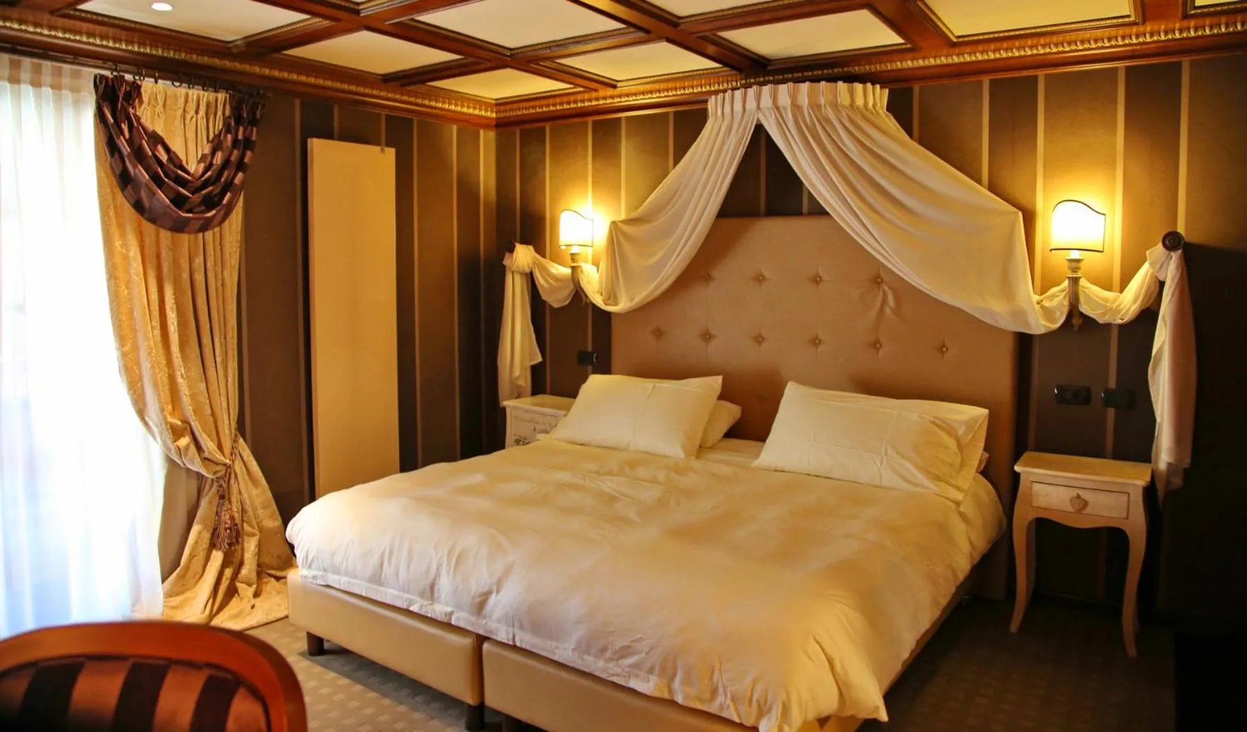 Bed in Relais du Chateau Blanc