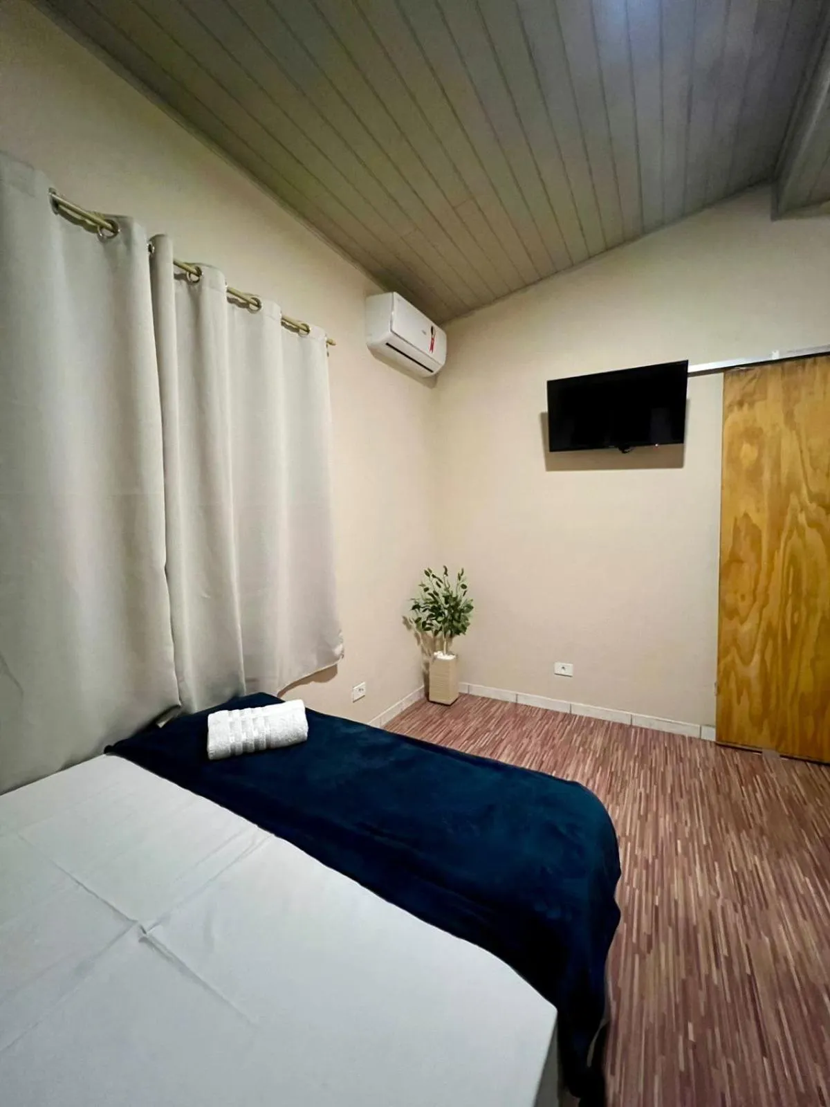 Bed in Pousada Casa Rosada Ilhabela