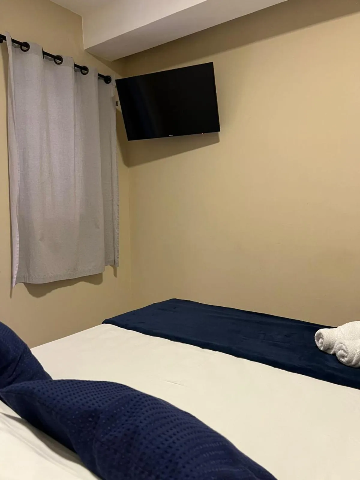 Bed in Pousada Casa Rosada Ilhabela