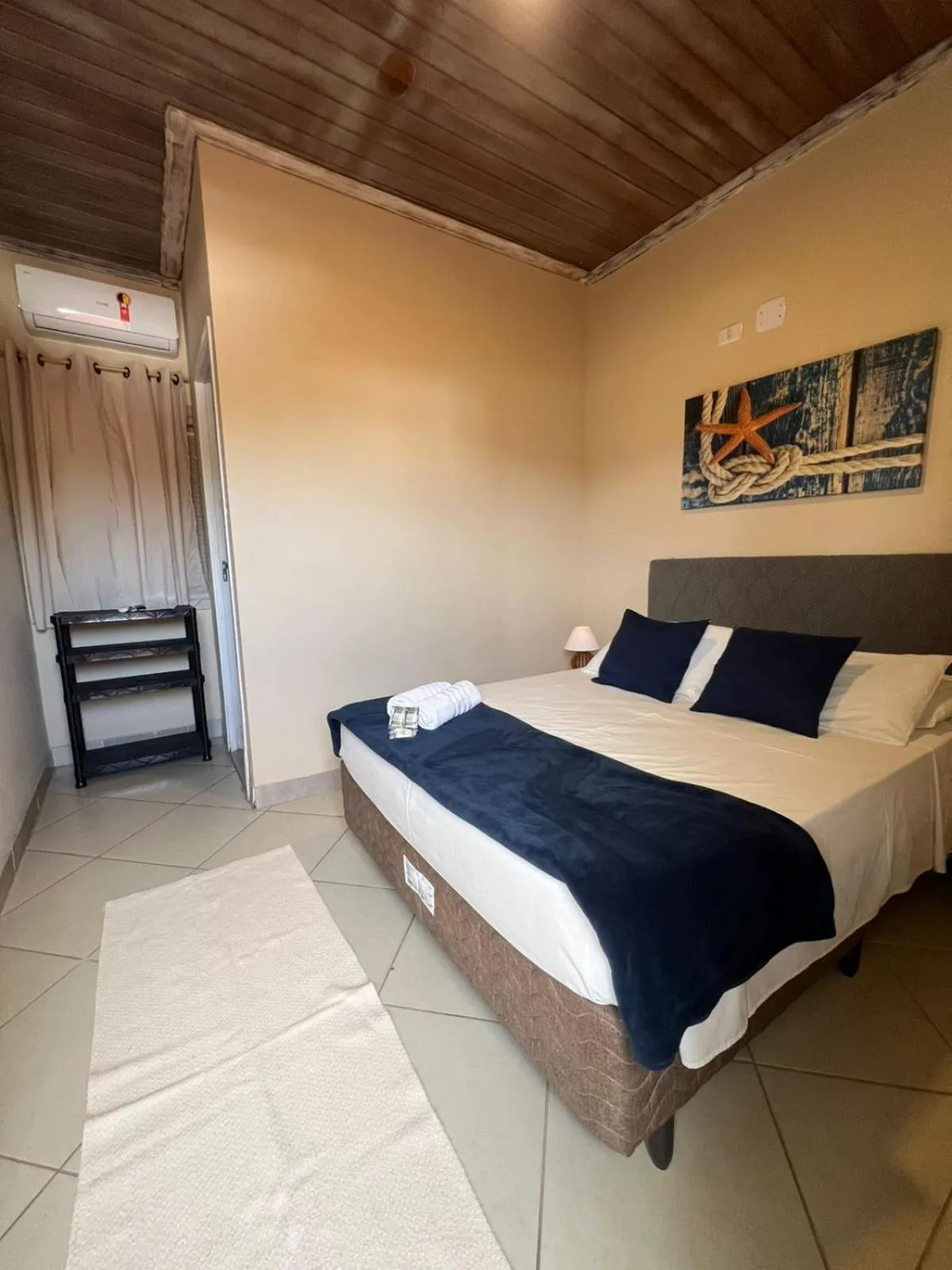 Bed in Pousada Casa Rosada Ilhabela