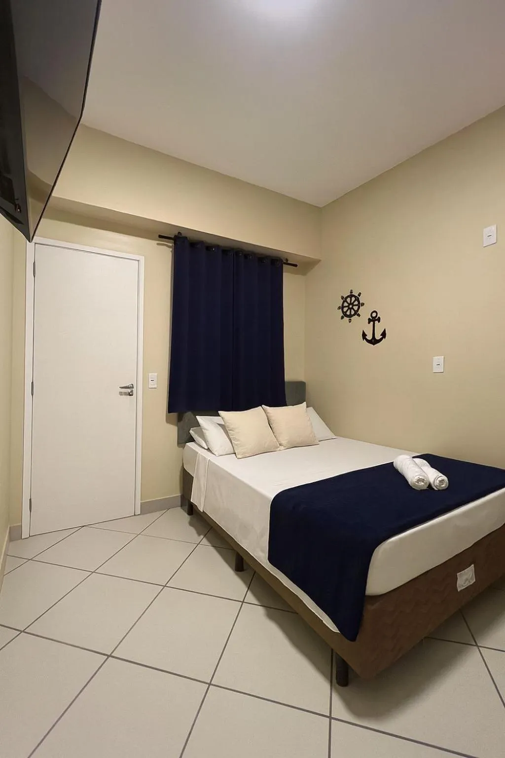 Bed in Pousada Casa Rosada Ilhabela