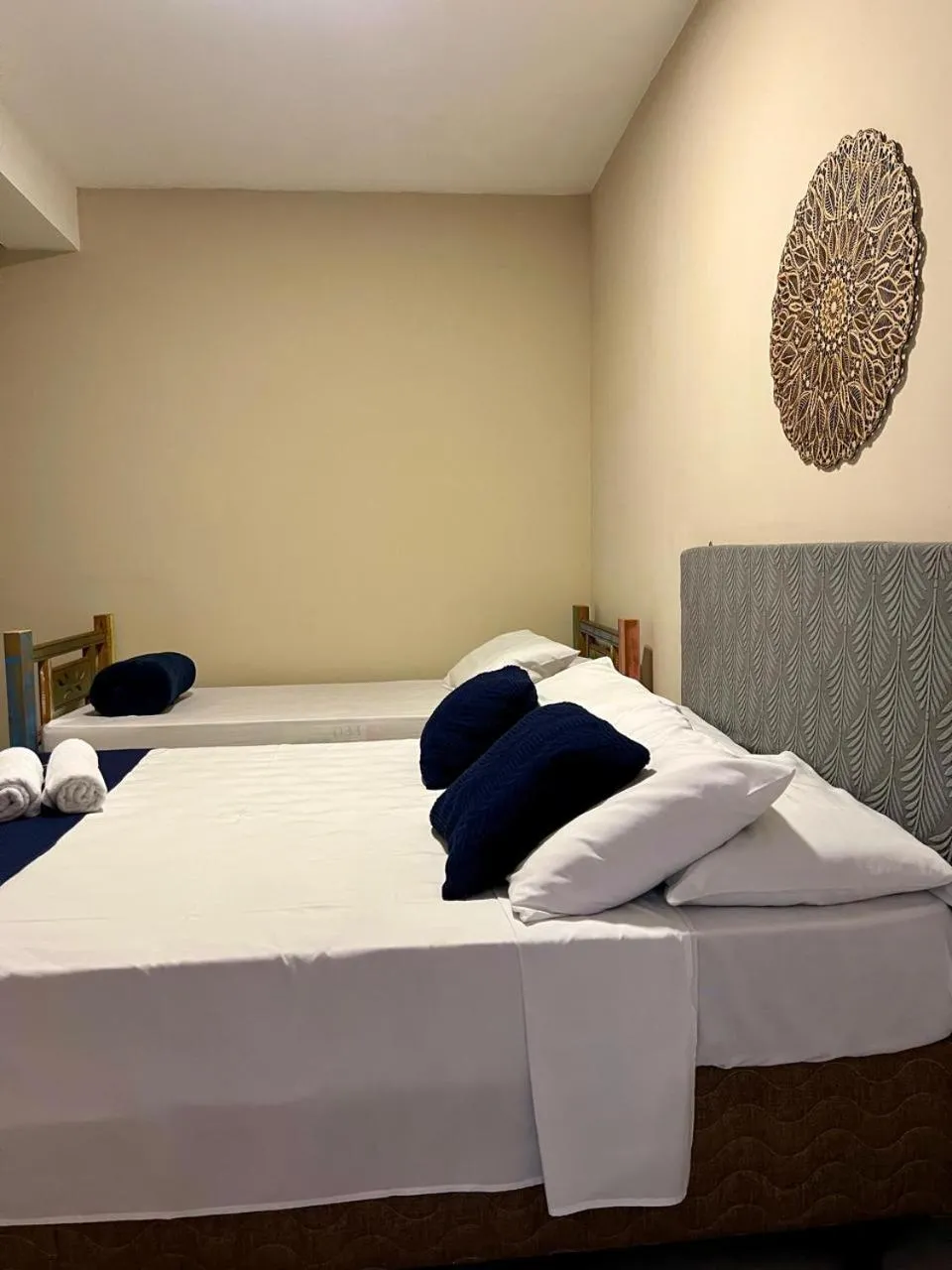 Bed in Pousada Casa Rosada Ilhabela