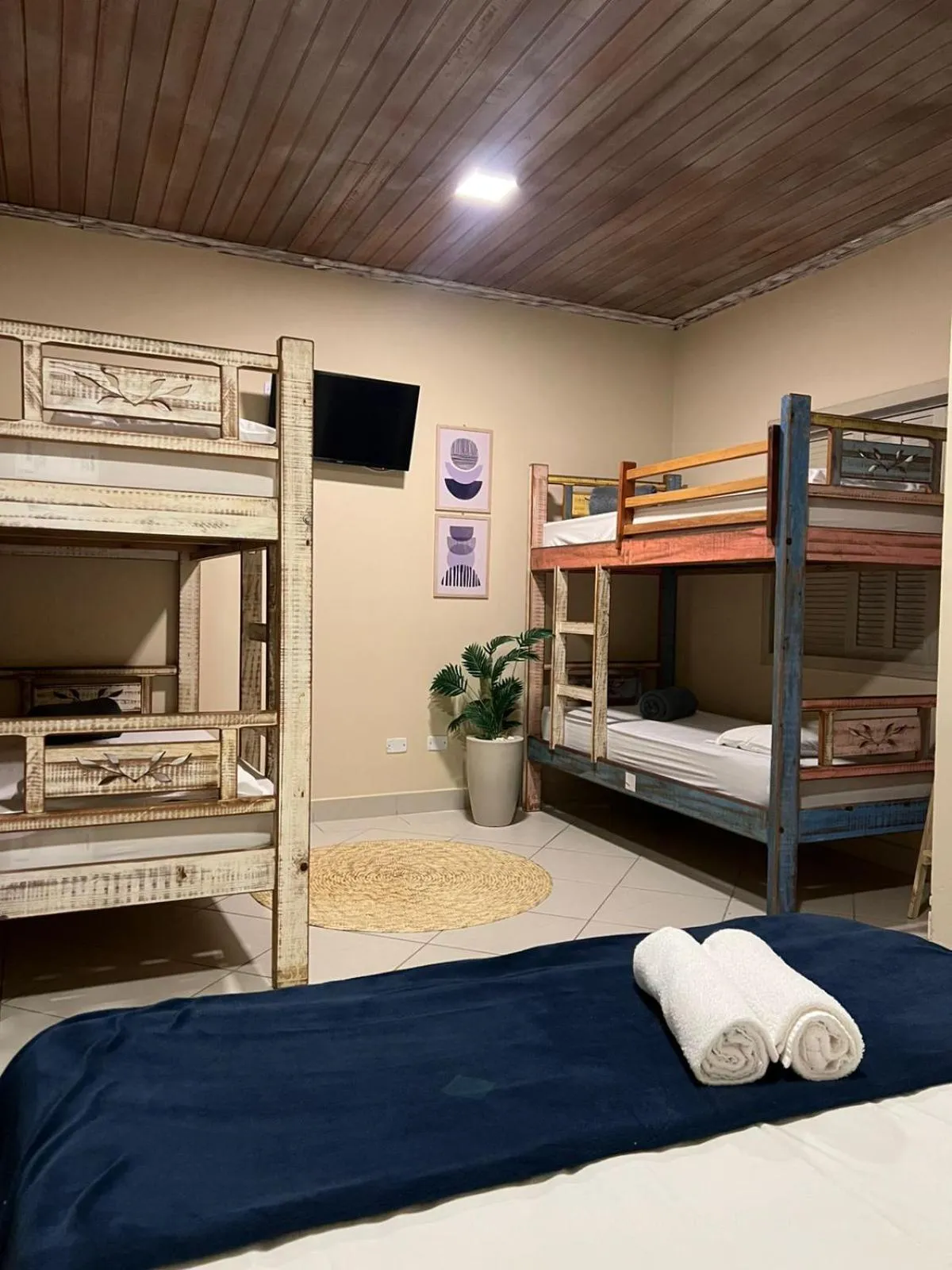 Bed in Pousada Casa Rosada Ilhabela