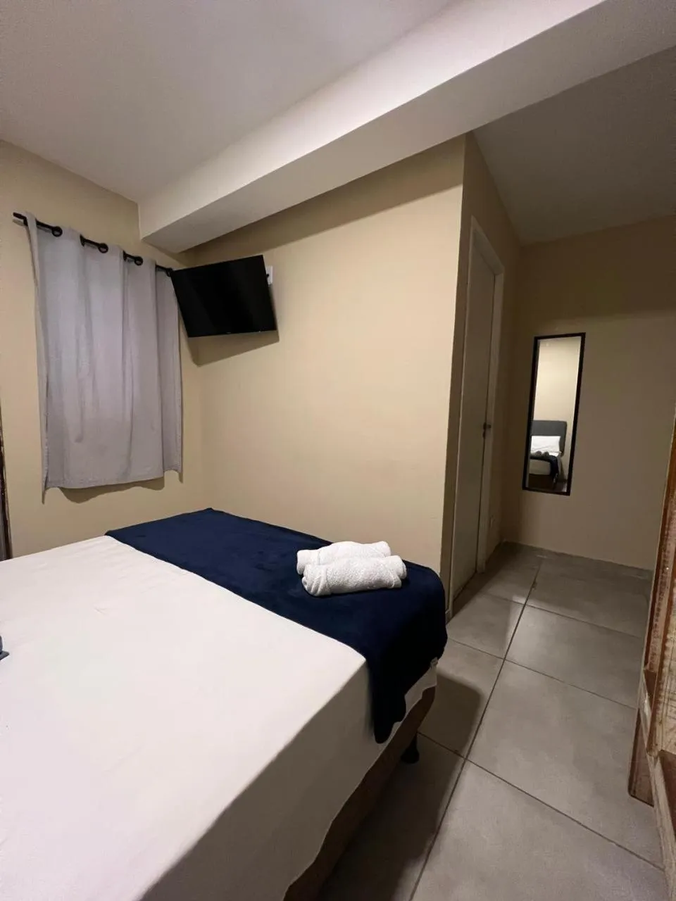 Bed in Pousada Casa Rosada Ilhabela