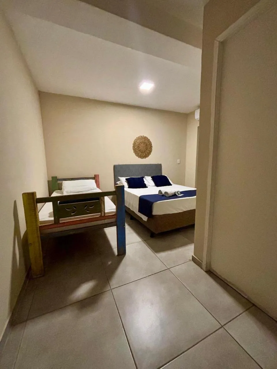 Bed in Pousada Casa Rosada Ilhabela