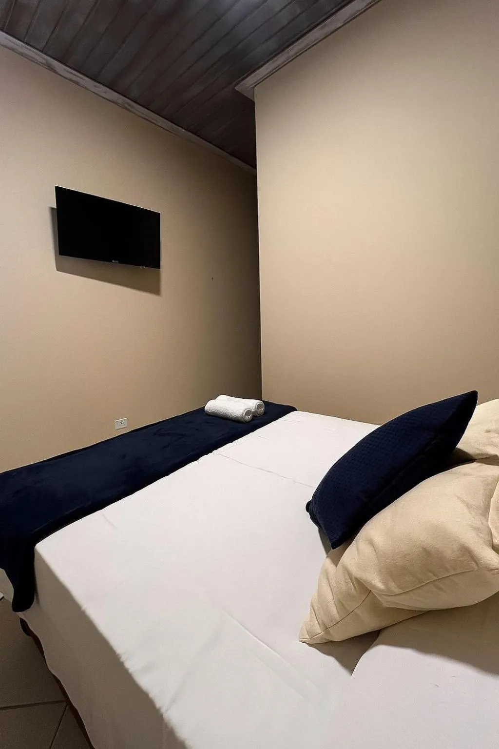 Bed in Pousada Casa Rosada Ilhabela