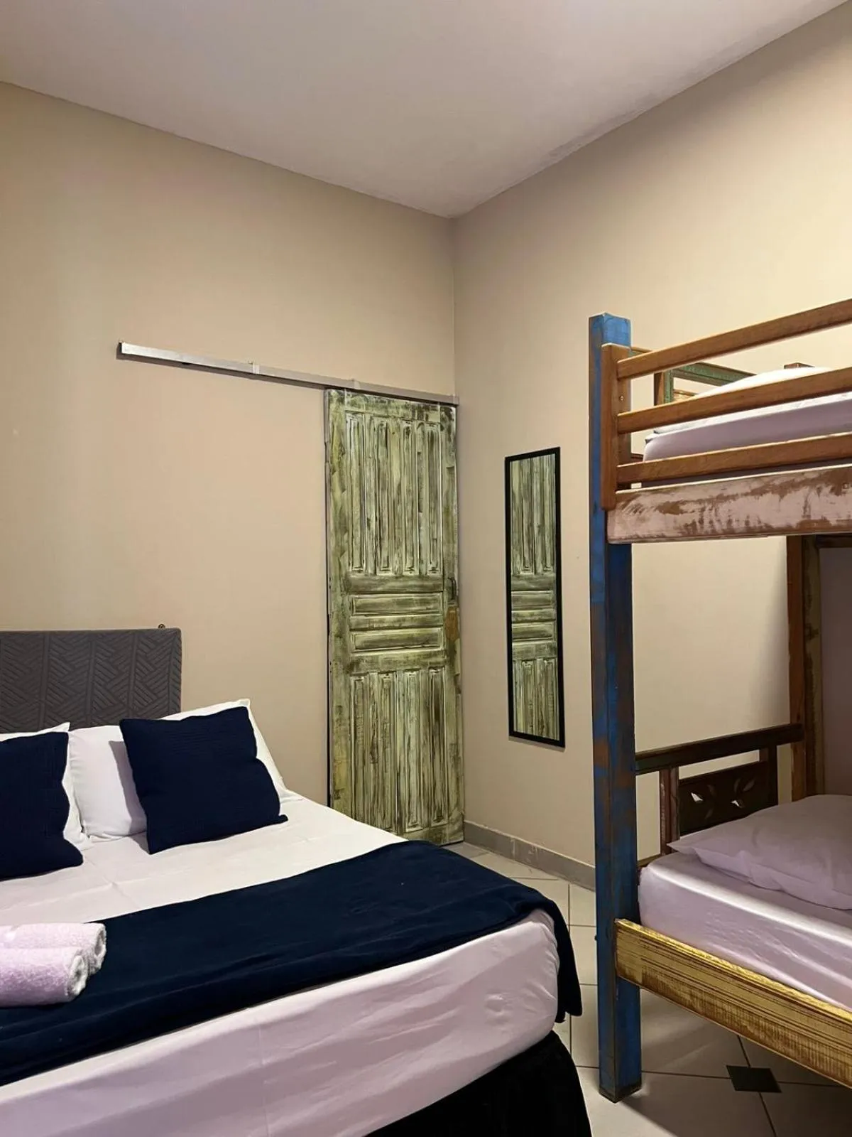 Bed in Pousada Casa Rosada Ilhabela