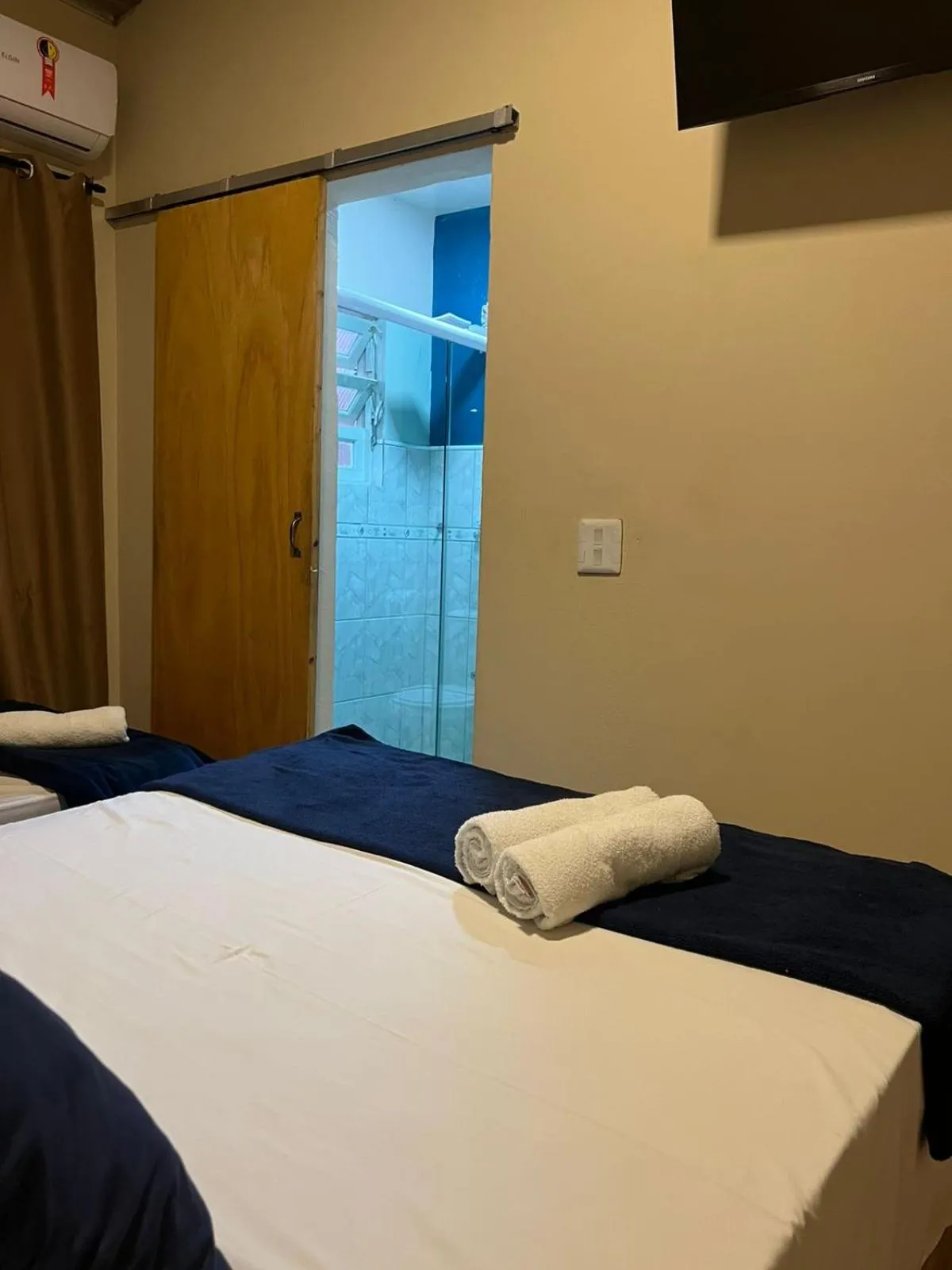 Bed in Pousada Casa Rosada Ilhabela