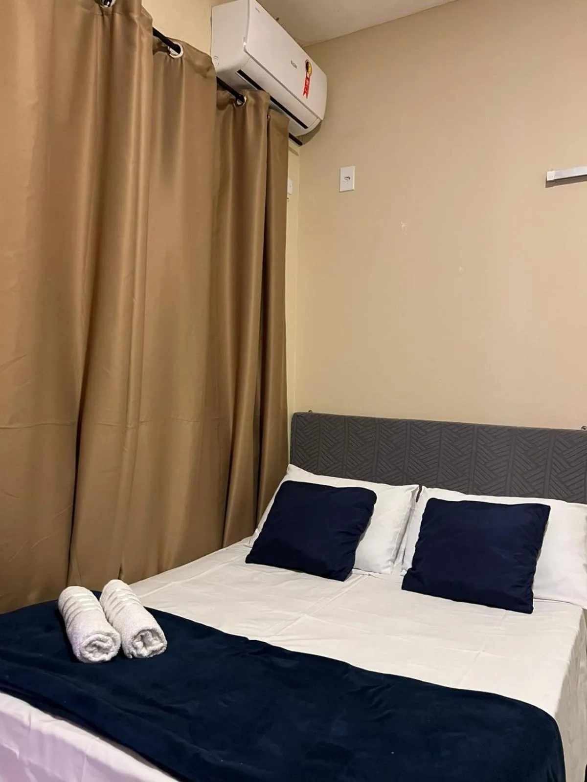 Bed in Pousada Casa Rosada Ilhabela