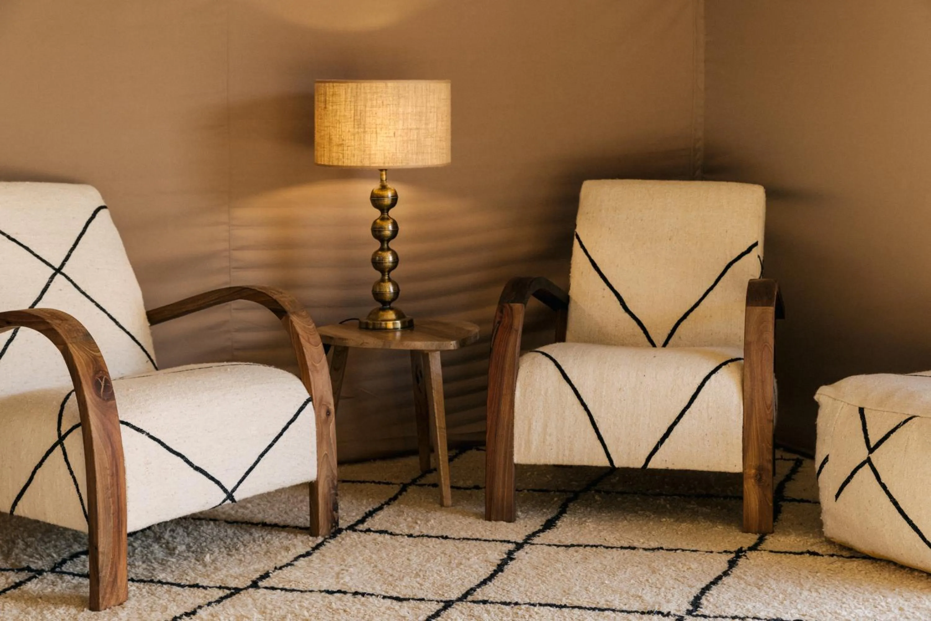 Seating area in Caravan Agafay by Our Habitas