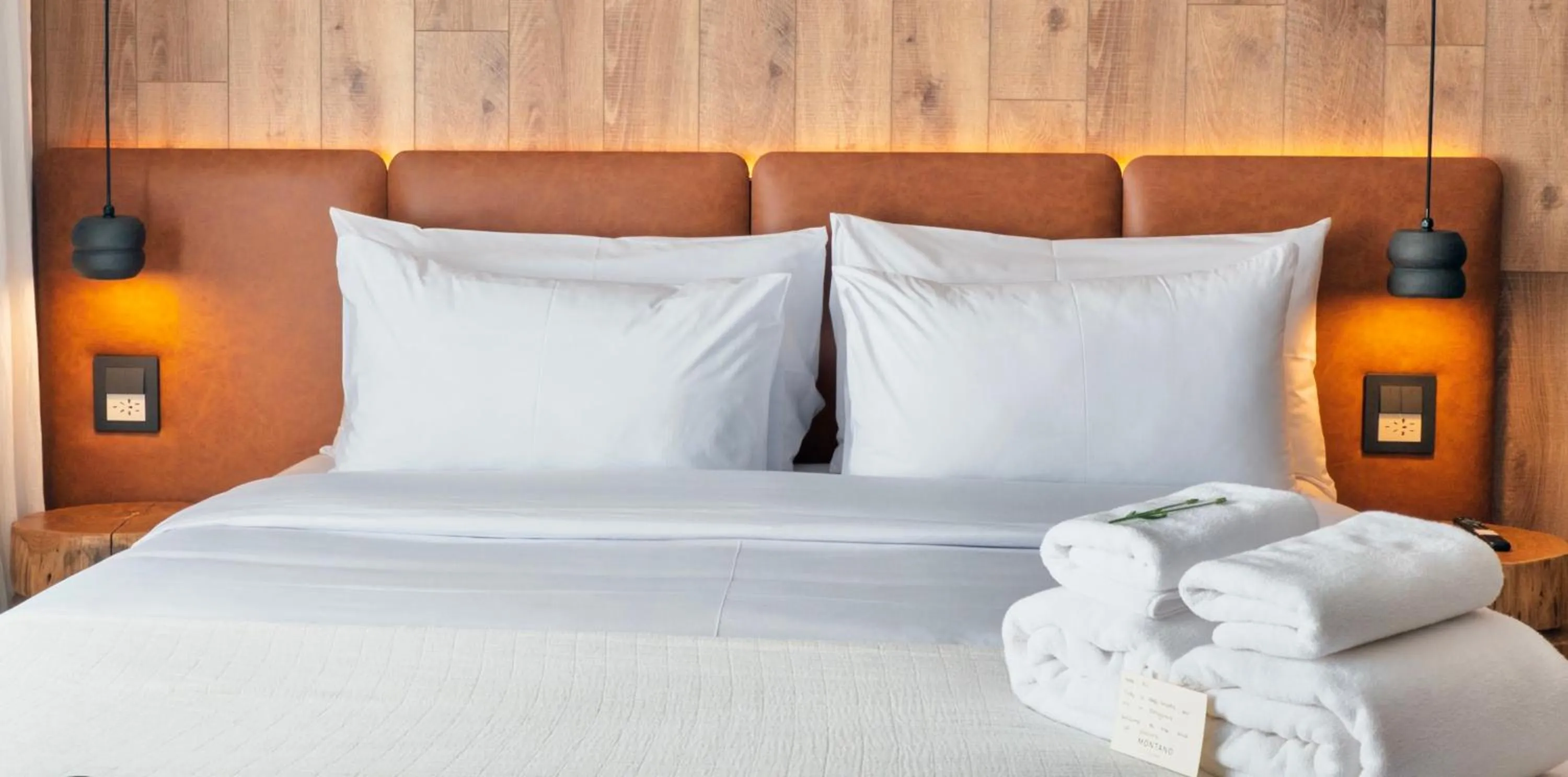 Bed in Montano Boutique Suites