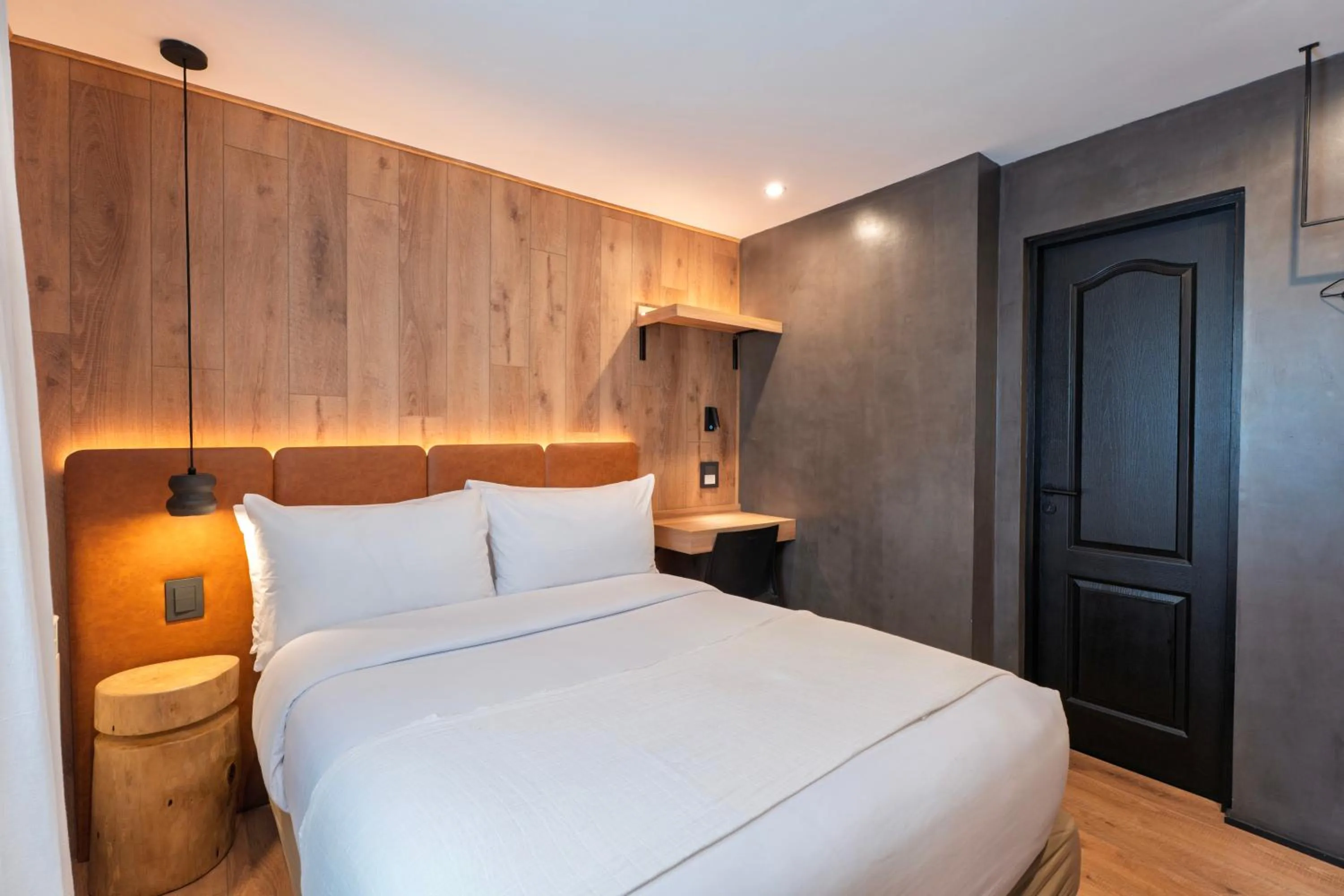 Bed in Montano Boutique Suites