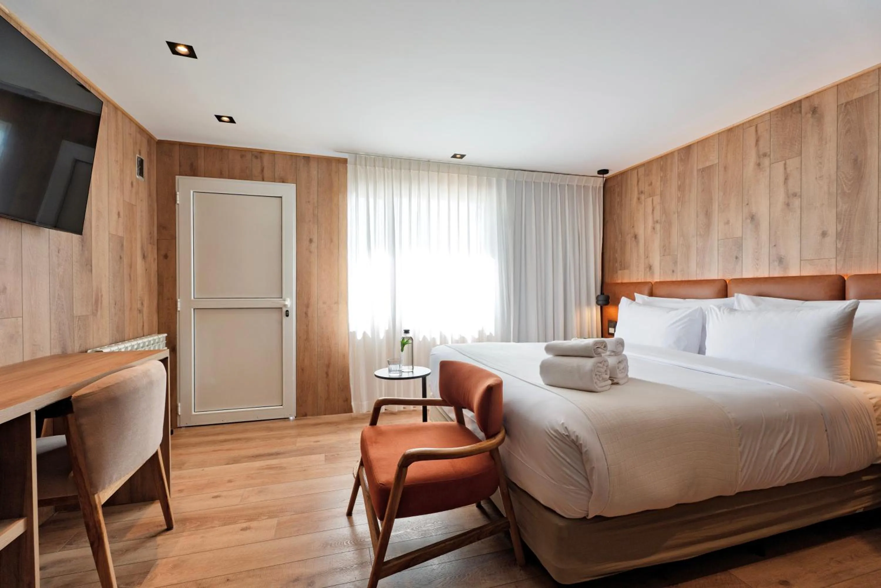 Bed in Montano Boutique Suites