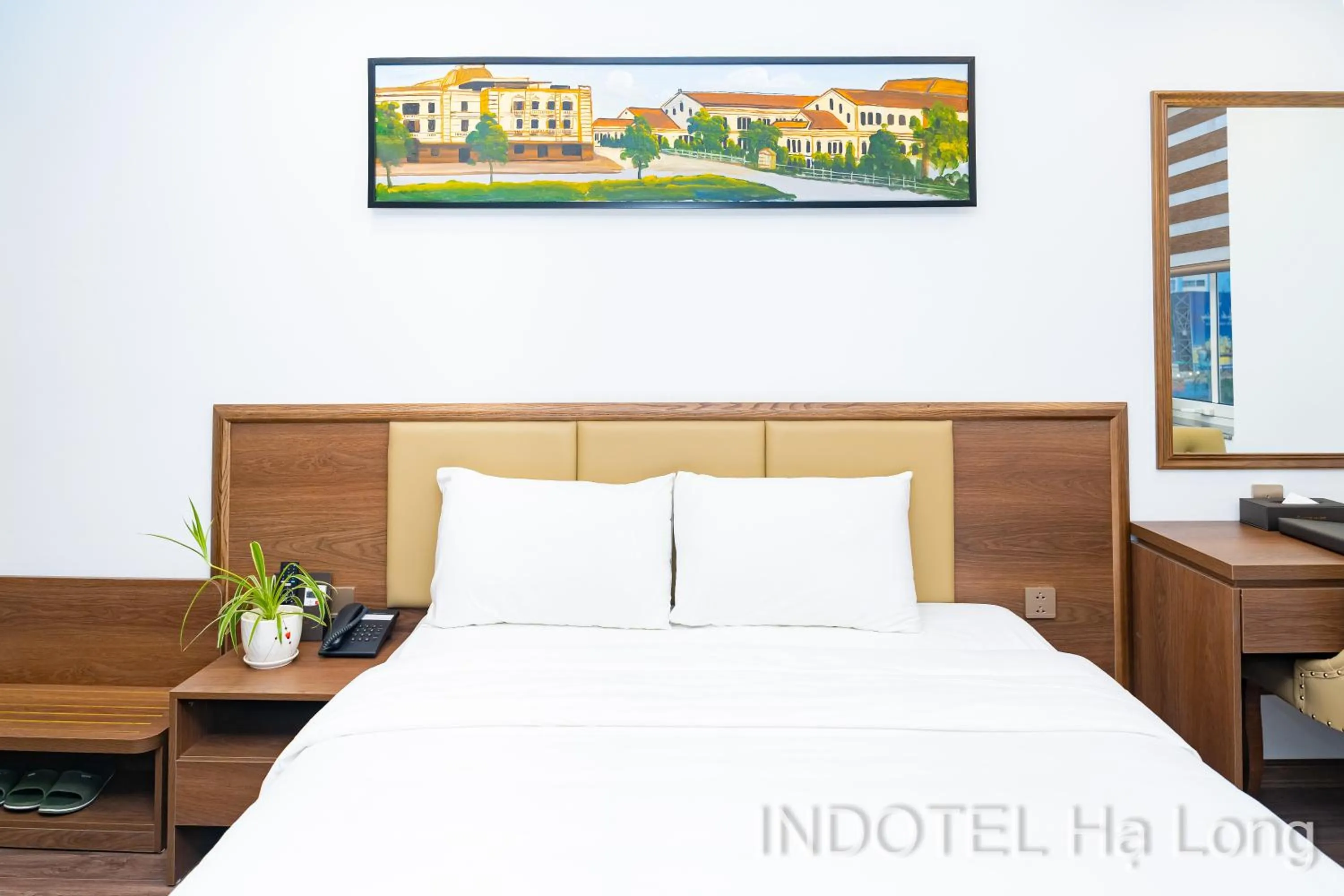 Bed in INDOTEL HALONG HOTEL
