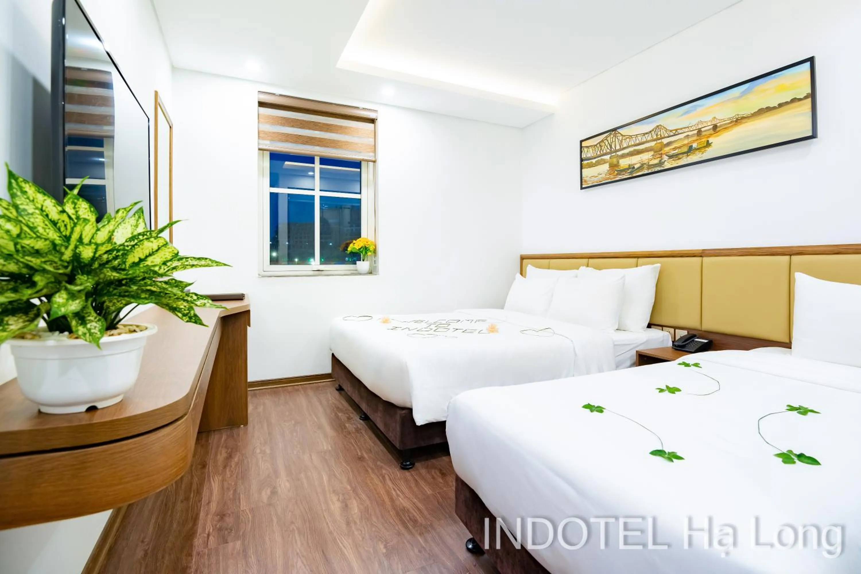 Bed in INDOTEL HALONG HOTEL