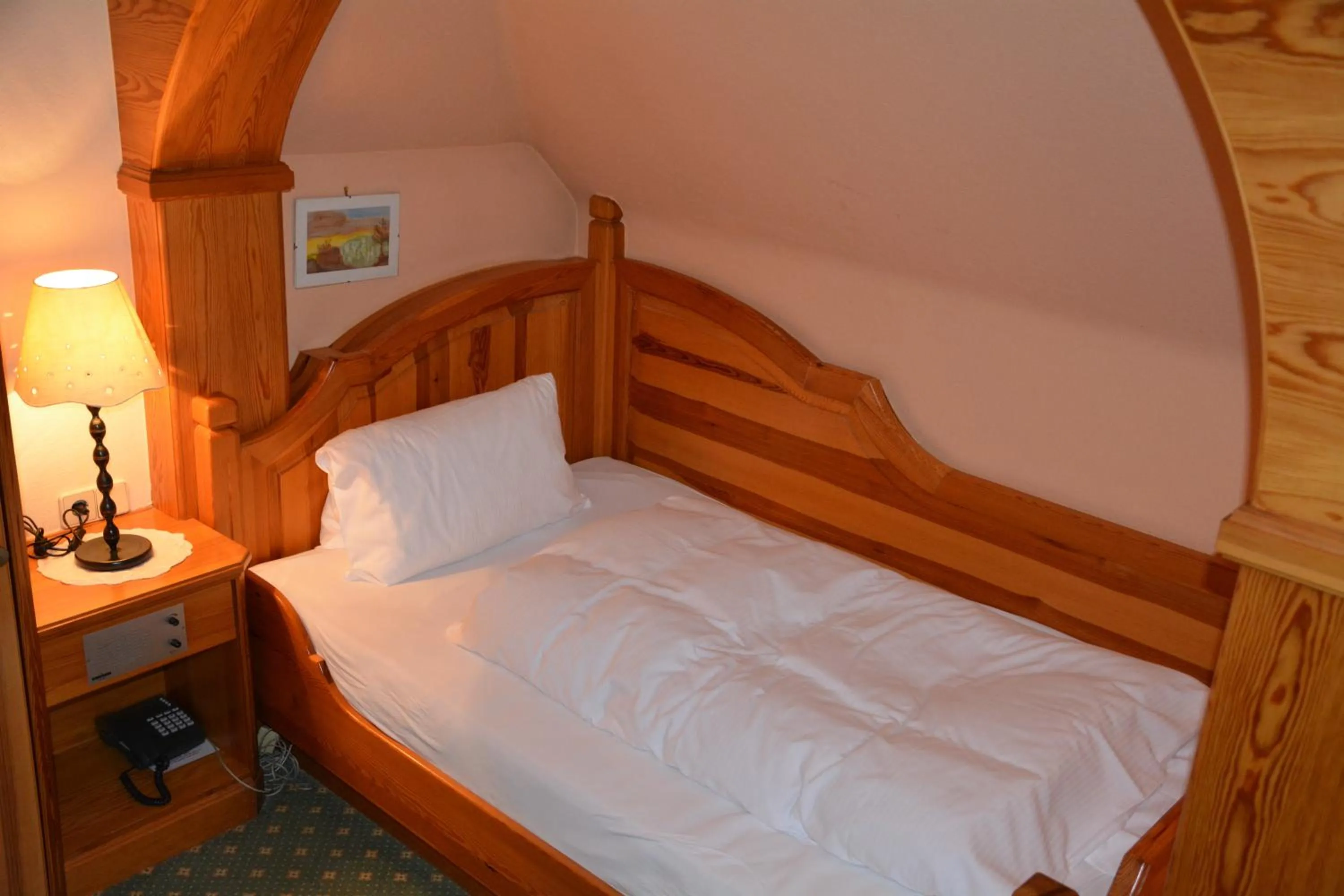 Decorative detail, Bed in Hotel-Restaurant Fischer