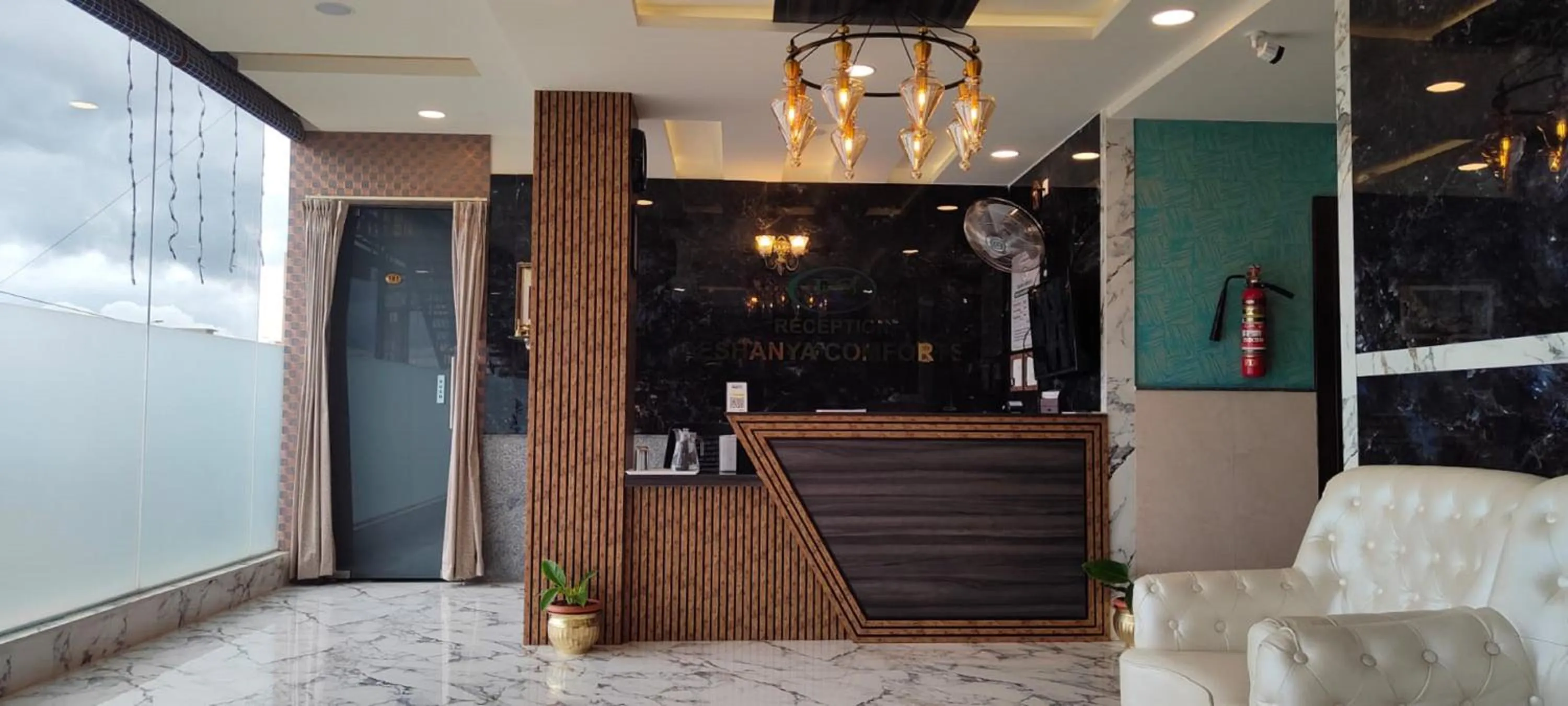 Lobby or reception in Eshanya Comforts