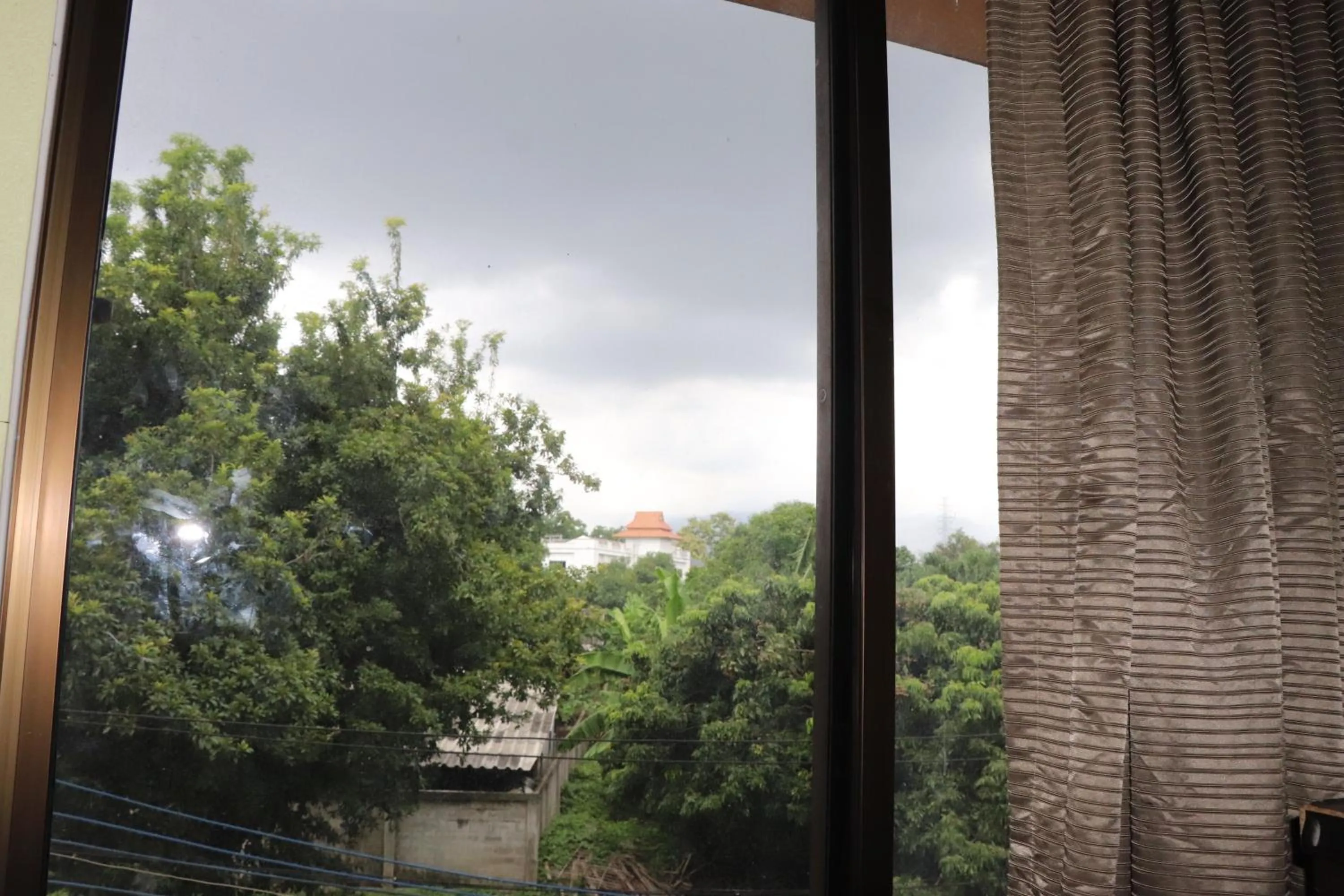 Bedroom in OYO 75408 Tipsiri Place