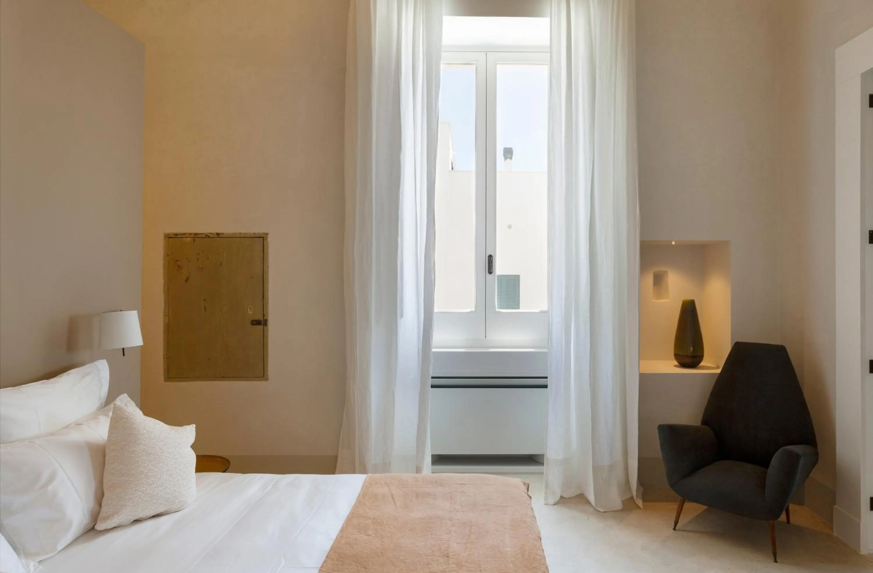 Bed in Palazzo Tafuri Boutique Hotel