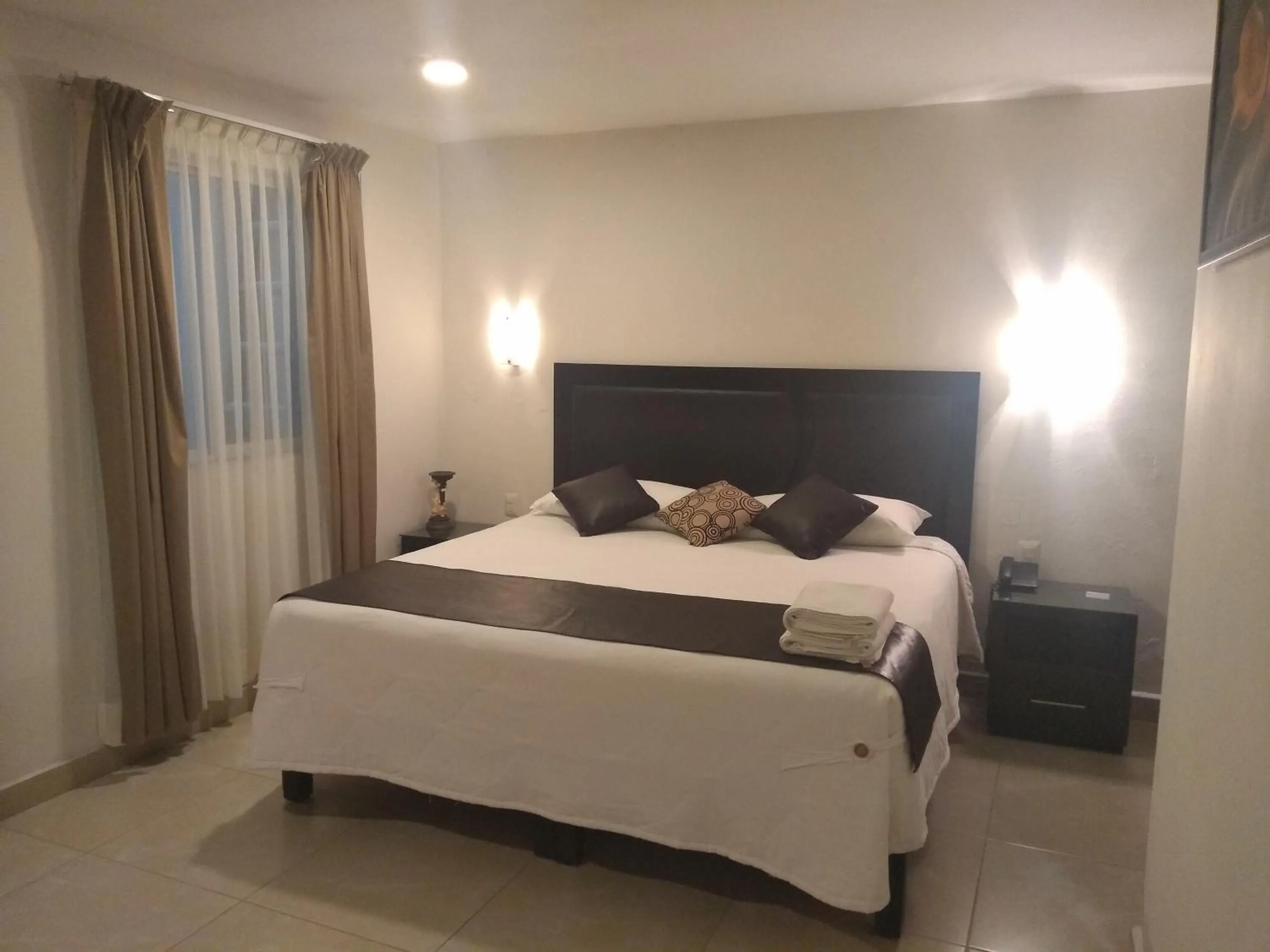 Bed in Hotel Anber